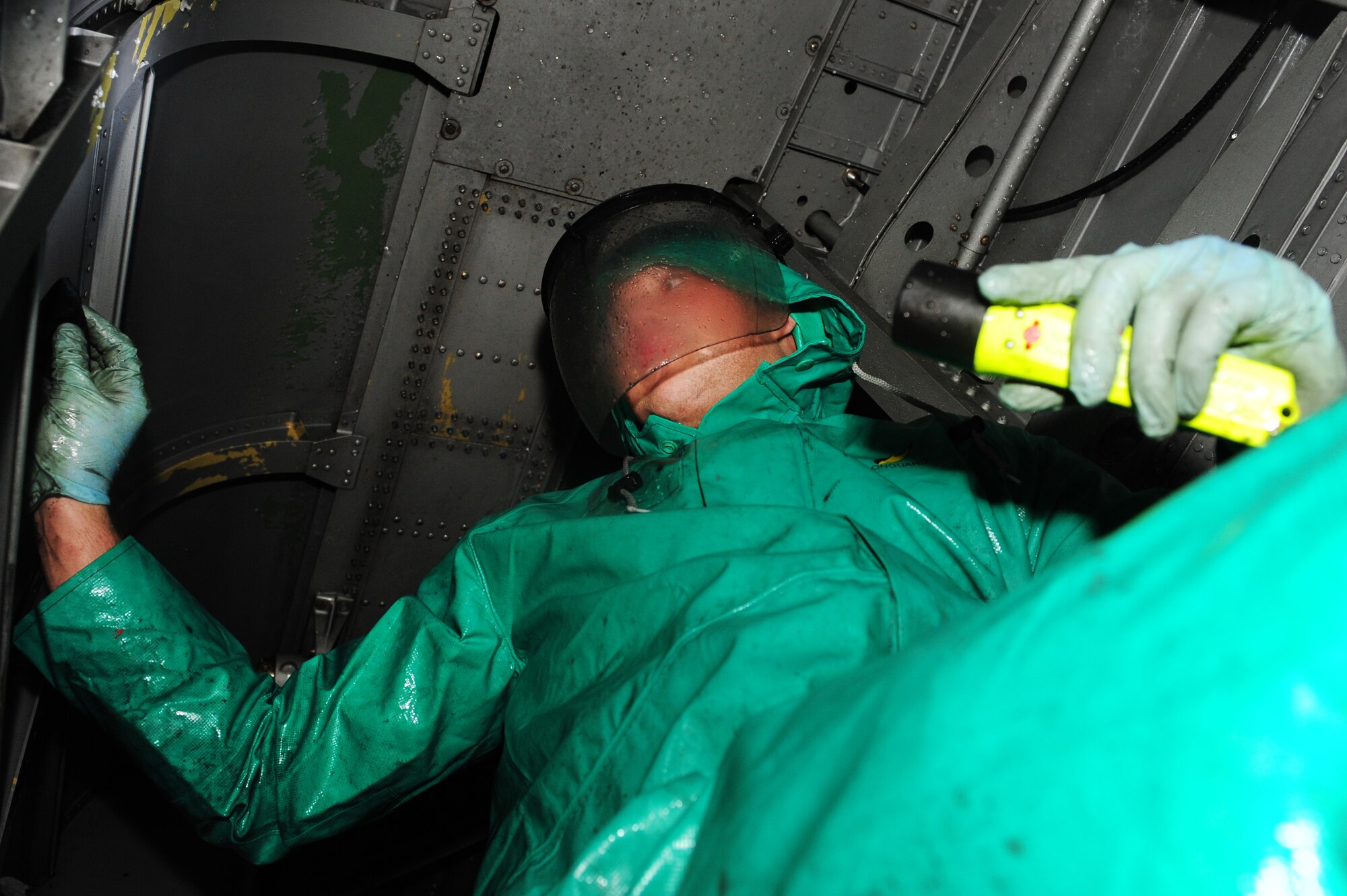 Airman 1st Class Blake Lee, a 314th Aircraft Maintenance Squadron crew chief, cleans the wheels of a C-130J Jan. 26, 2011, at Little Rock Air Force Base, Ark. Each C-130 is washed once every 150 days.  (Photo by U.S. Air Force Senior Airman Jim Araos)