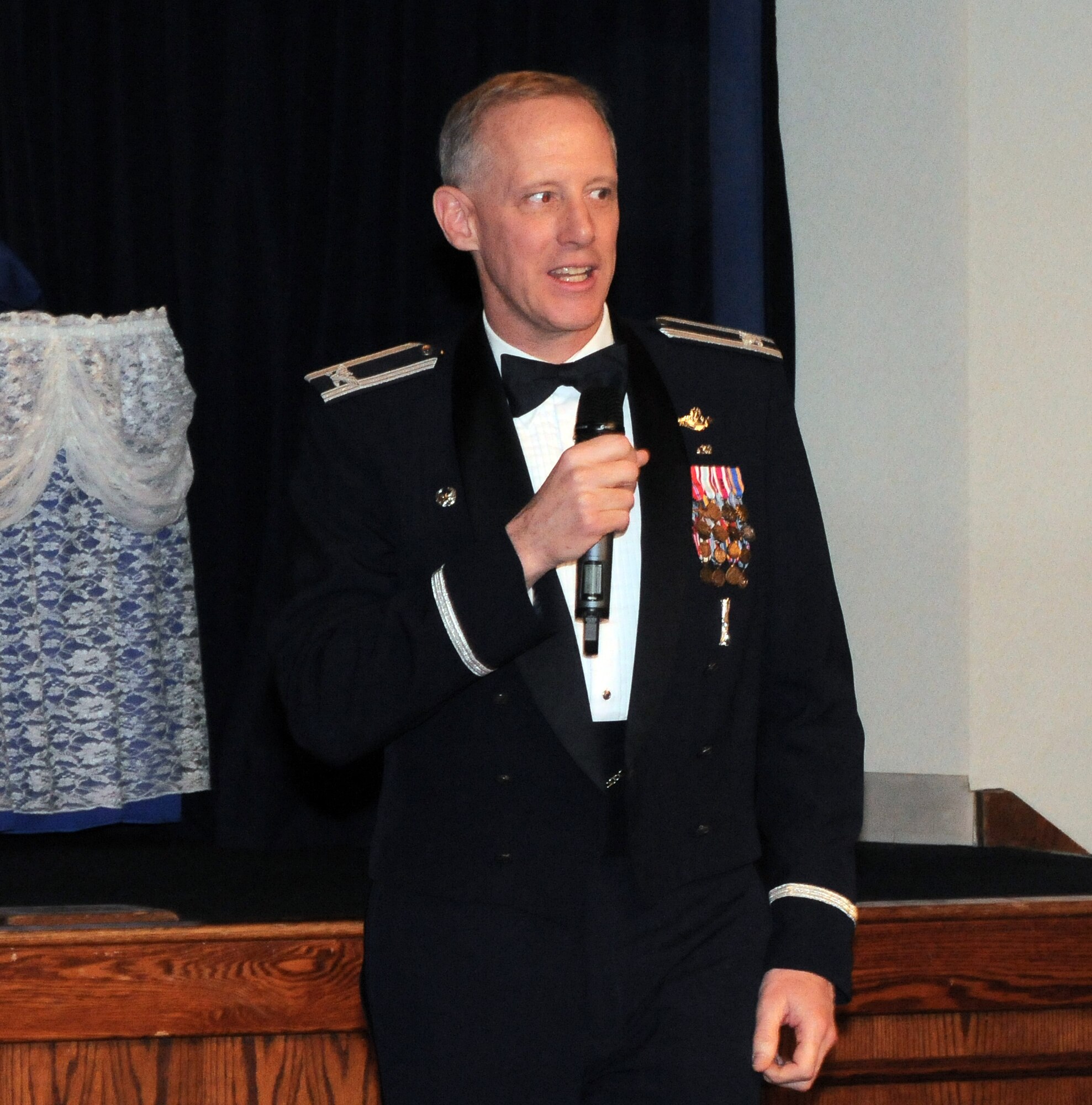 YOKOTA AIR BASE, Japan -- Col. Otto Feather, 374th Airlift Wing commander, congratulates Yokota's newest chief master sergeants during a Chief Master Sergeant Recognition ceremony here Jan. 29. Seven U.S. Air Force and three Japan Air Self-Defense Force members were selected for promotion to the highest enlisted rank. (U.S. Air Force photo/Airman 1st Class Katrina R. Menchaca)