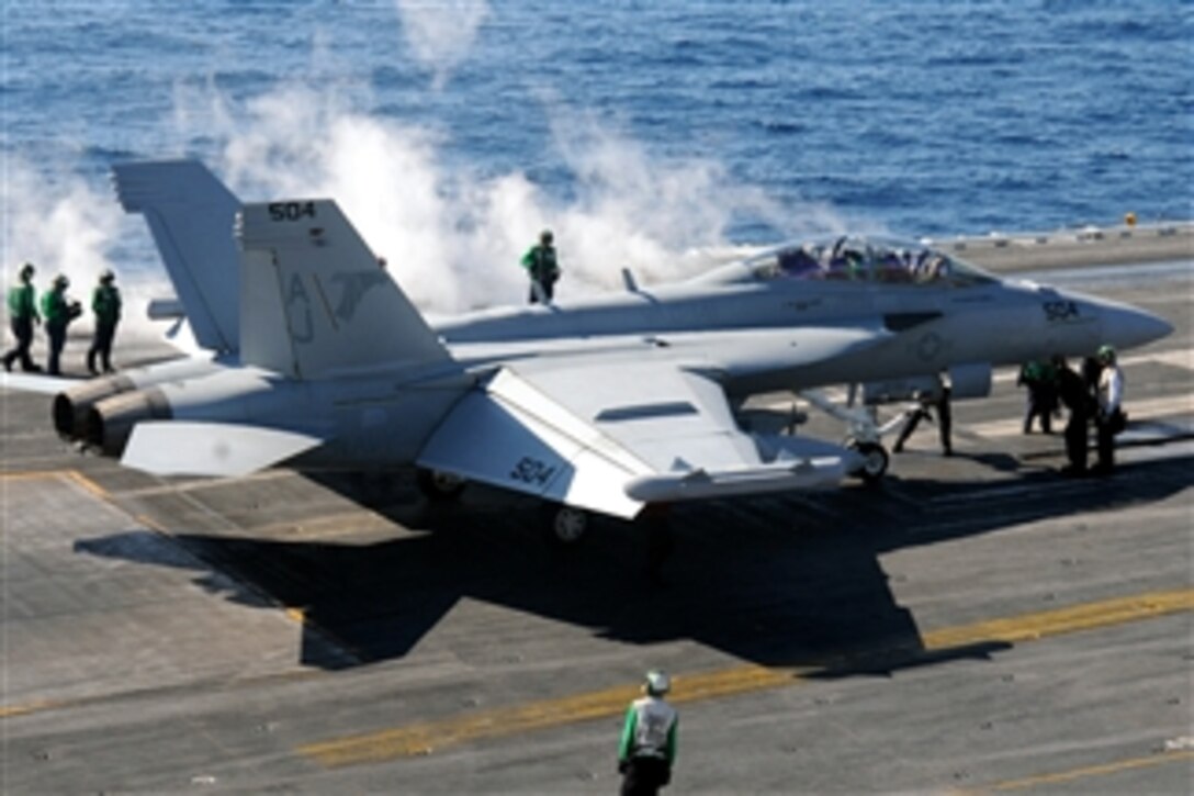An EA-18G Growler assigned to Electronic Attack Squadron 141 prepares to take off from the aircraft carrier USS George H.W. Bush (CVN 77).  The carrier is underway in the Atlantic Ocean conducting a composite training unit exercise.  