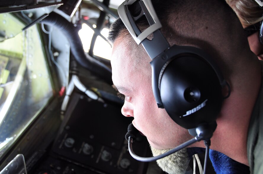 Staff Sgt. Robert Miller, 96tjh Air Refueling Squadron boom operator, passes fuel to one of six Marine Corps F/A-18 Prowlers from Iwakuni Air Base, Japan, takes on fuel from a 96th Air Refueling Squadron KC-135 during a recent mission over the Pacific near Okinawa. This was the first off-station operational mission for the 96th ARS since it re-activated as a Total Force Integration active partner with the Hawaii Air National Guard?s 203rd ARS, July 23, 2010. The air refueling squadron plans to be fully operational as of March 1, 2011. (U.S. Air Force photo/Maj. Jeff Paget)