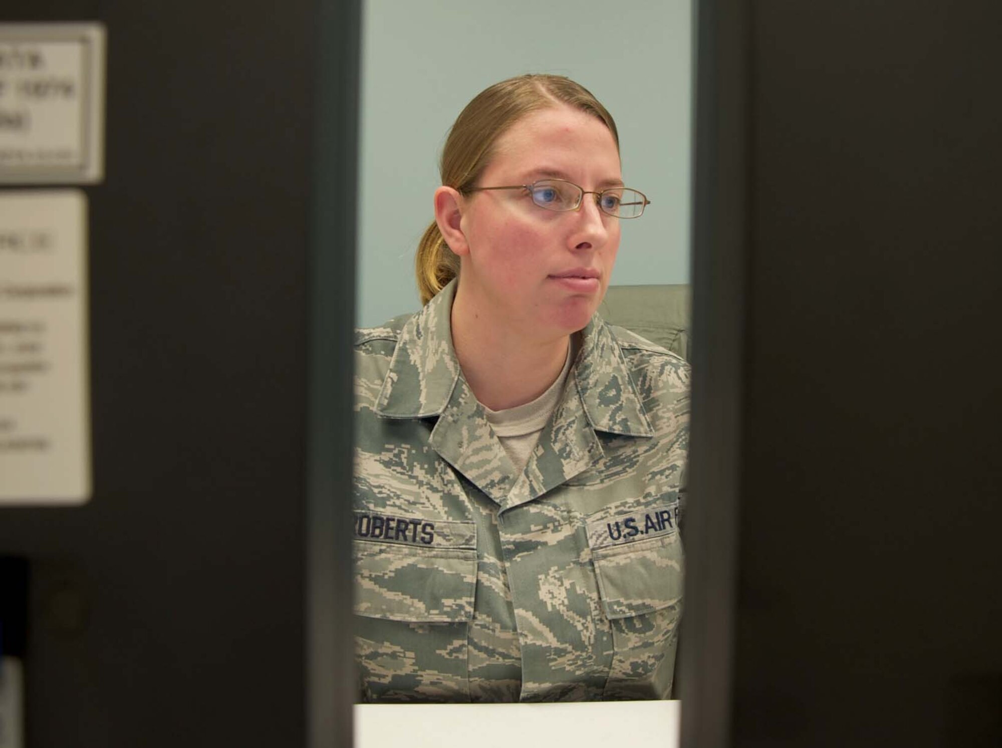 Senior Airman Stacey Roberts, 22nd Maintenance Group Knowledge Operations Management journeyman, reviews pending decorations for members of the 22nd MXG.  In addition to tracking decorations, the Benton, Ark., native is responsible for daily information management programs for more than 1,000 personnel in the three maintenance squadrons.  (U.S. Air Force photo/Senior Airman Abigail Klein)

