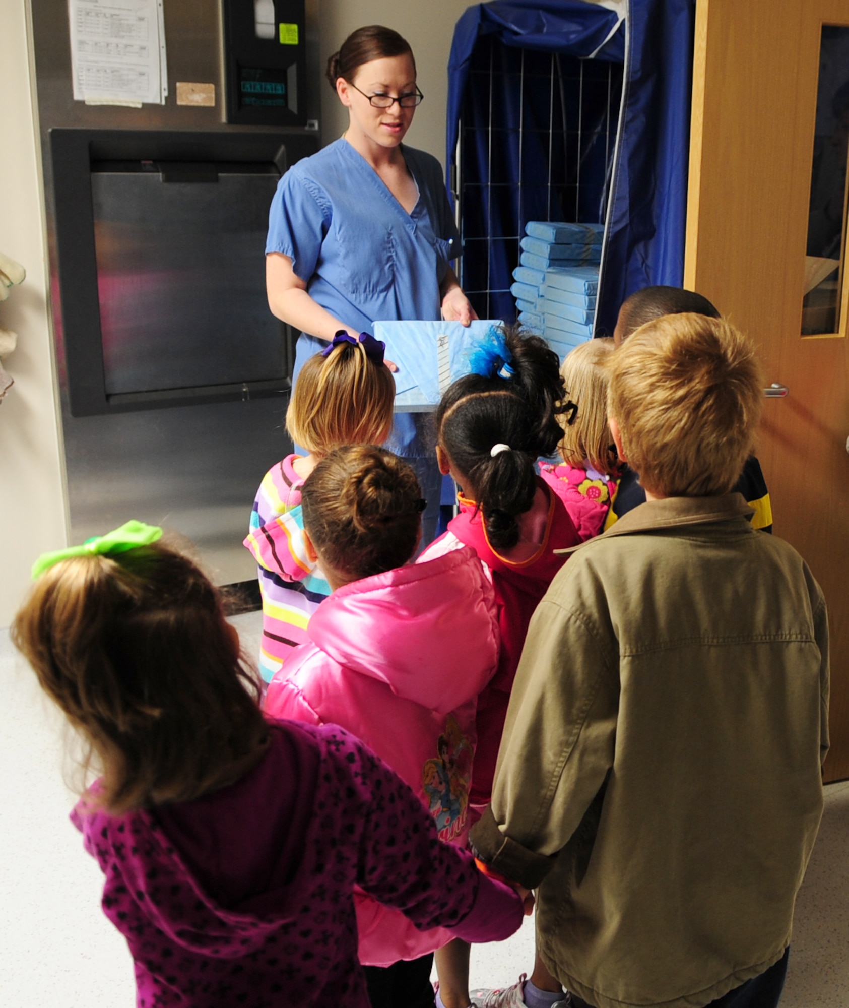 MOODY AIR FORCE BASE, Ga.-- Children from the Child Development Center tour the room where dental technicians sanitize tools that are used to clean teeth Feb. 1. The children were able to take a tour of the entire dental clinic and ask staff members several questions. (U.S. Air Force photo/Senior Airman Stephanie Mancha)(RELEASED)