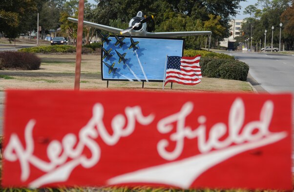 A display heralding the upcoming Keesler Air Show and Open House, March 19-20, has been placed in the median of Larcher Boulevard west of the base exchange and commissary.  As a tribute to Keesler’s 70th anniversary celebration this year, the roadside signs were painted in the Burma-Shave scheme, which was featured prominently from the 1920s to the 1950s. The six signs conclude with Keesler Field, which was the installation’s moniker in 1941. After the Keesler Field sign is a 4-foot by 8-foot display featuring a sixaircraft formation of the Blue Angels and an American Flag over blue skies. The display was created by Lt. Col. Jonathan Wright, 81st Contracting Squadron commander.  (U.S. Air Force photo by Kemberly Groue)
