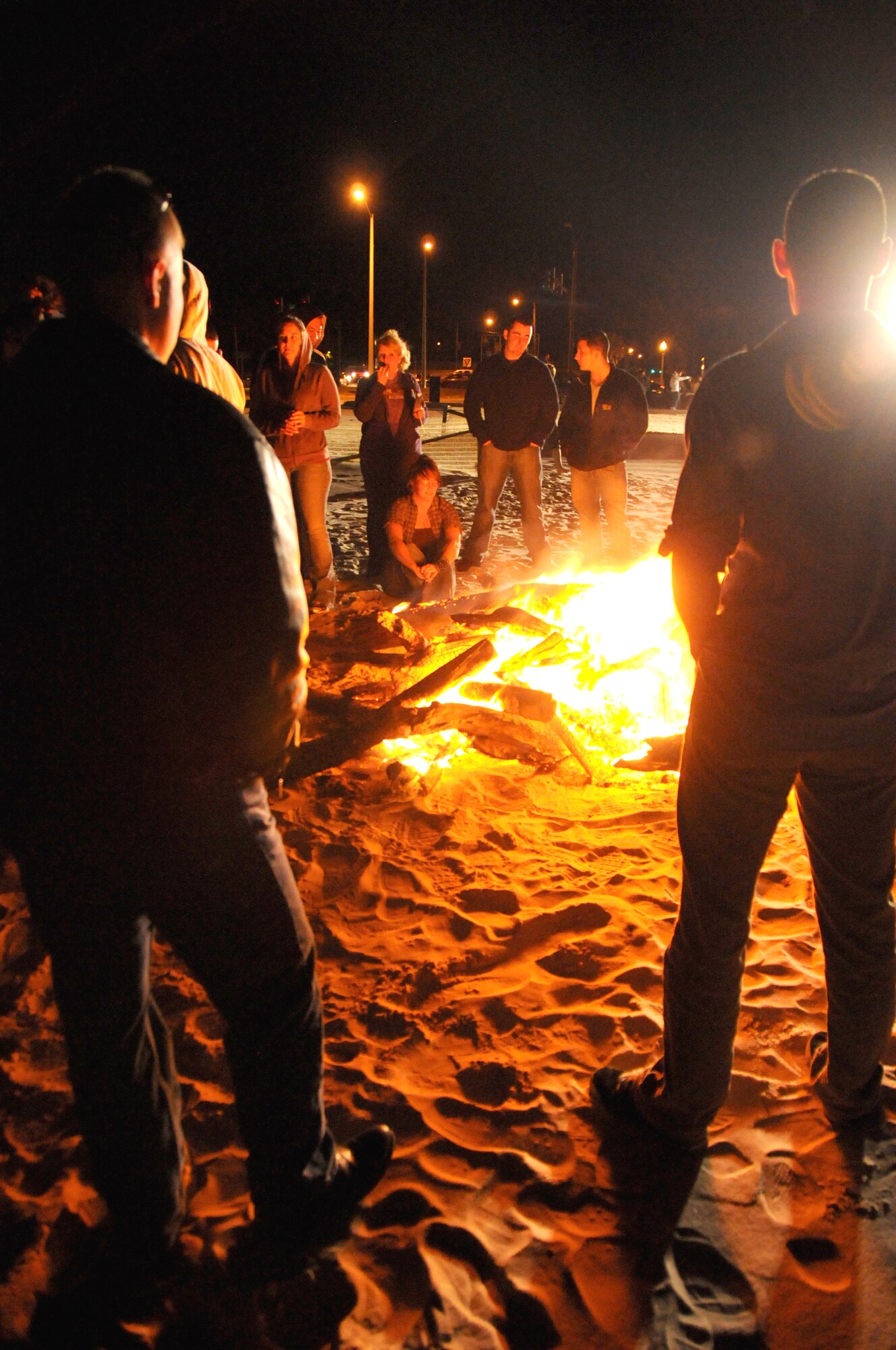 Saturday, Keesler’s permanent party single Airmen gathered on the beach at the foot
of White Avenue in Biloxi for an evening of food, fun and fellowship sponsored by
the airman and family readiness center.  (U.S. Air Force photo by Kemberly Groue)