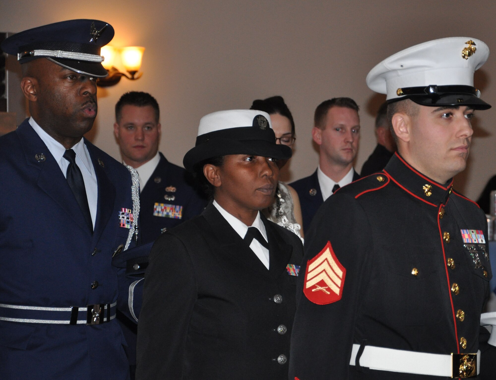 JOINT BASE MCGUIRE-DIX-LAKEHURST, N.J. - A joint service detail performs a Table of Honor ceremony at the start of the 514th Air Mobility Wing Annual Awards Banquet held Jan. 29 at The Community Center, here. The purpose of the ceremony is to acknowledge and honor the service of all prisoners of war, those missing in action and past and present veterans. (U.S. Air Force photo/Capt. Kelly Smyth)