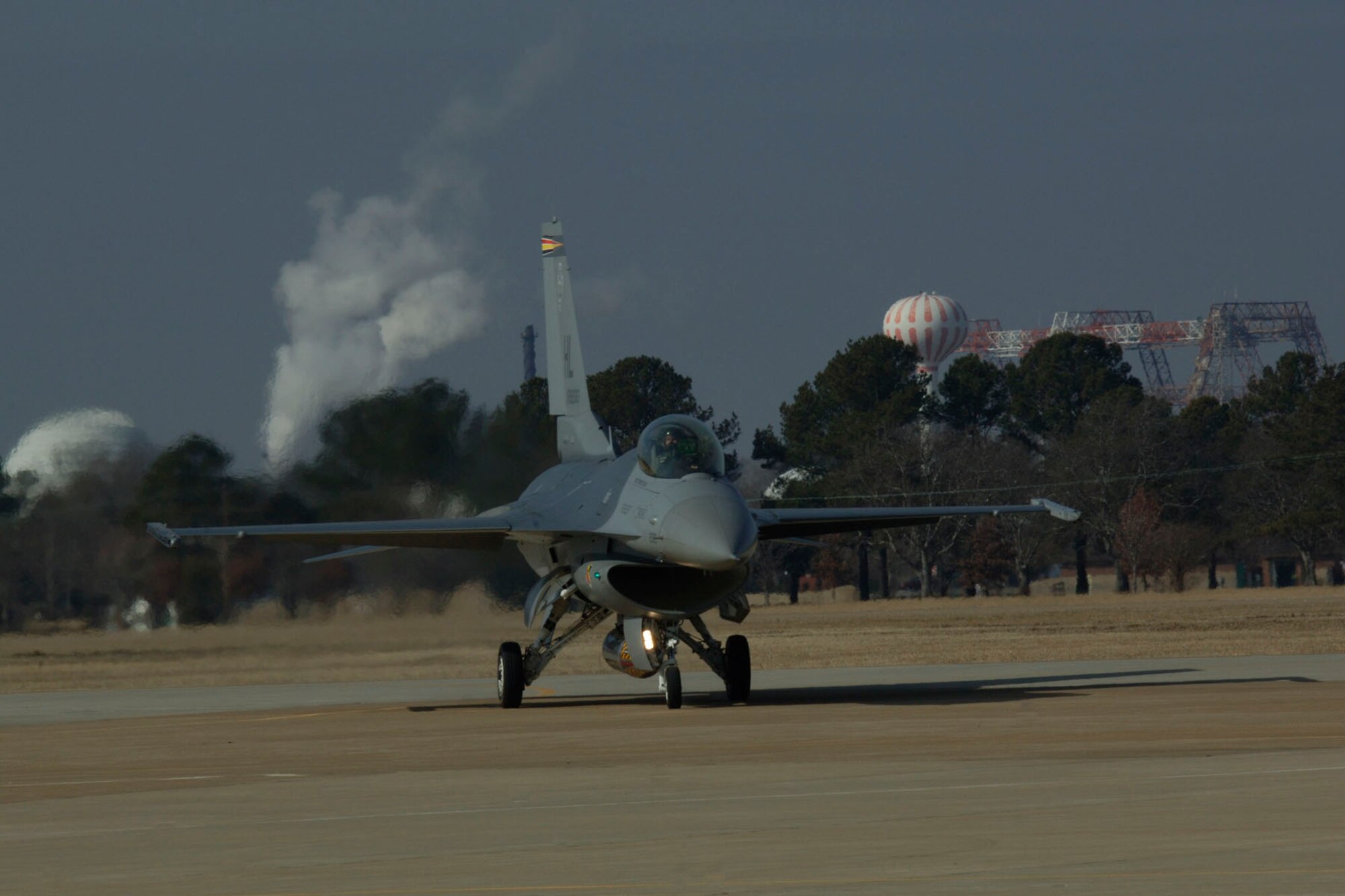 LANGLEY AIR FORCE BASE, Va. – Capt. Garrett Dover, 388th Viper West Coast Demonstration Team flight commander, taxis an F-16 down the runway following a practice run Feb. 1. The maneuverable multi-role F-16 Fighting Falcon, also known as the Viper, provides a relatively low-cost, high-performance weapon system. (U.S. Air Force photo/Airman 1st Class Racheal Watson)(RELEASED)