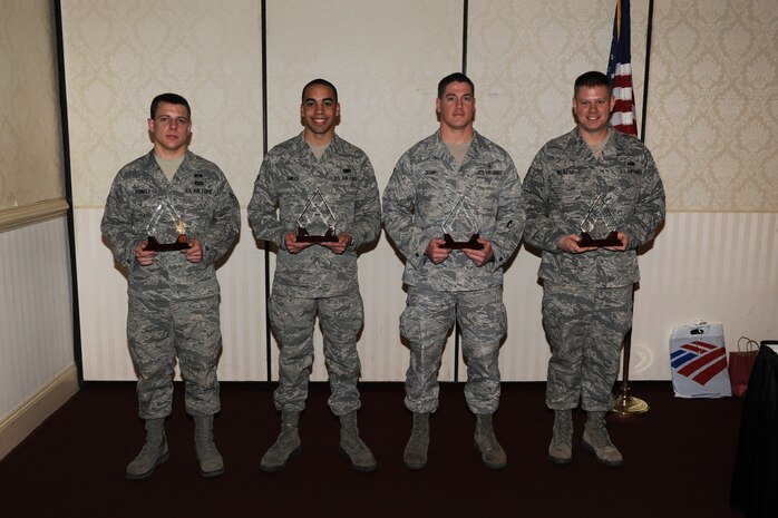 (Left to right) Airman 1st Class Nathan D. Pringle, Airman 1st Class Daniel Y. Smiles, Senior Airman Carl M. Doan and Staff Sgt. Matthew R. Westad were recognized as February’s Diamond Sharp winners Feb. 1, 2011 at the Charleston Club. Airman are chosen by their respective First Sergeants and recognized during an official ceremony on the first Tuesday of every month. Airman Pringle is from the 628th Civil Engineer Squadron, Airman Smiles is from the 628th Logistics Readiness Squadron, Airman Doan is from the 628th Medical Group and Sergeant Westad is from the 373rd Training Squadron, Det 5. (U.S. Air Force photo by Tech. Sgt. Chrissy Best)