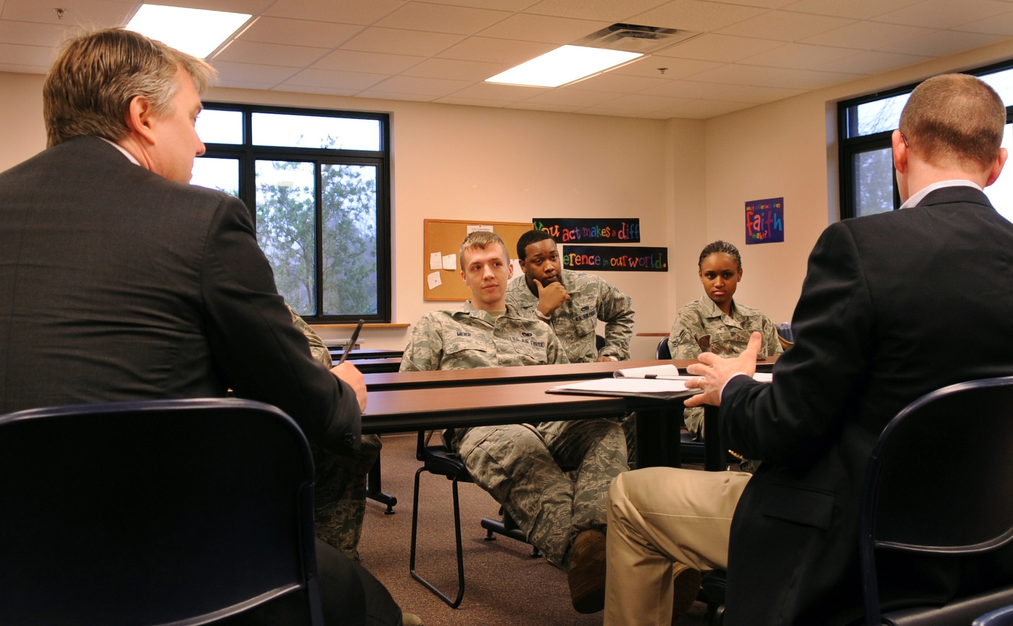 MOODY AIR FORCE BASE, Ga. -- Rick Gates, PKF Consulting vice president, and Adam Maclennan, PKF Consulting senior consultant, discuss final thoughts with Airmen on how to improve Moody’s Dining Facility Feb. 1. A couple key thoughts were to extend the DFAC’s hours of operation and offer a better variety of foods. (U.S. Air Force photo/Airman 1st Class Douglas Ellis)(RELEASED)
