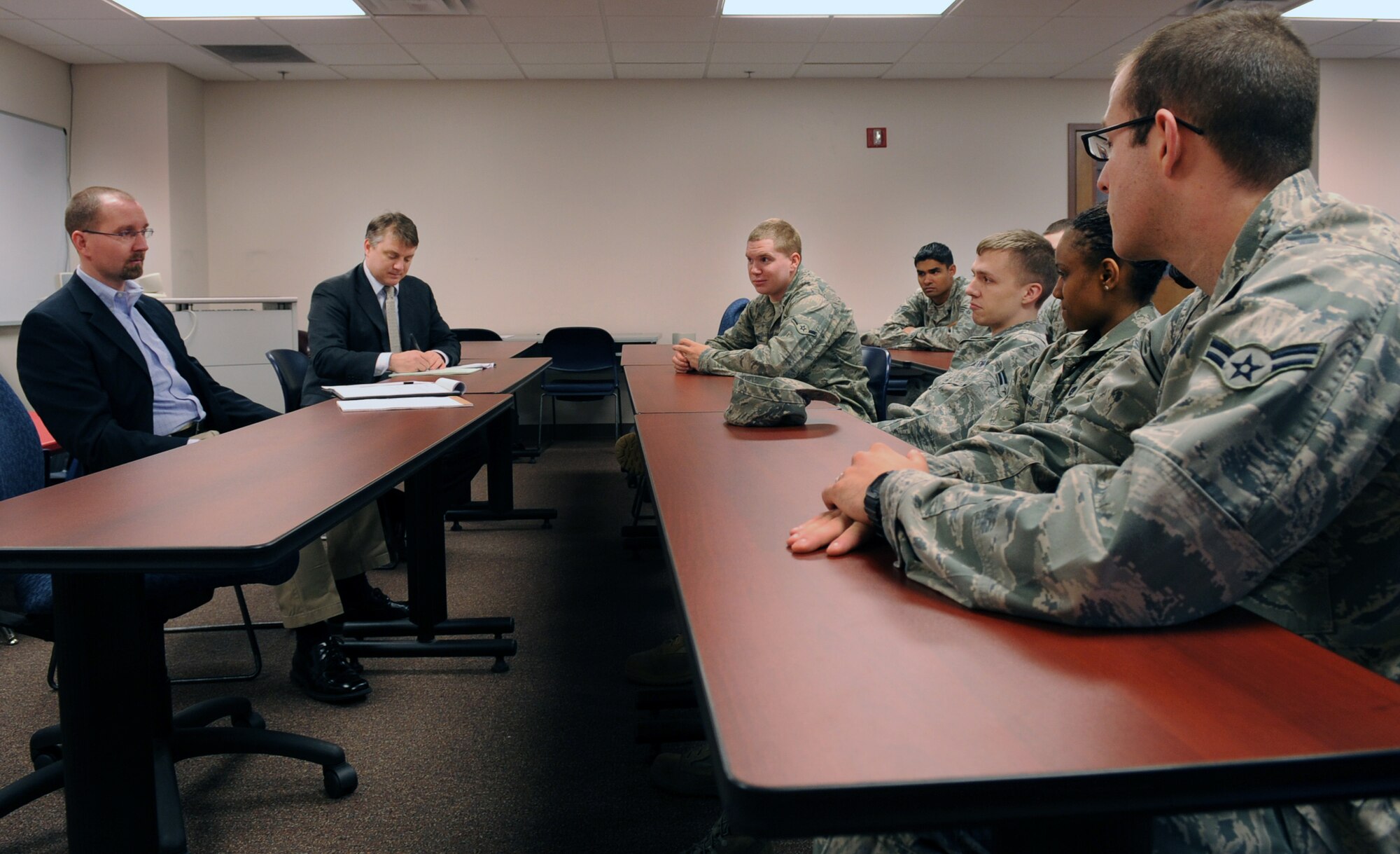 MOODY AIR FORCE BASE, Ga. -- Rick Gates, PKF Consulting vice president, and Adam Maclennan, PKF Consulting senior consultant, listen and take notes as Moody members talk about their concerns with the Georgia Pines Dining Facility Feb. 1. One of the concerns was that Airmen who work mid-shift are often unable to go to the dining facility because of the hours of operation. (U.S. Air Force photo/Airman 1st Class Douglas Ellis)(RELEASED)
