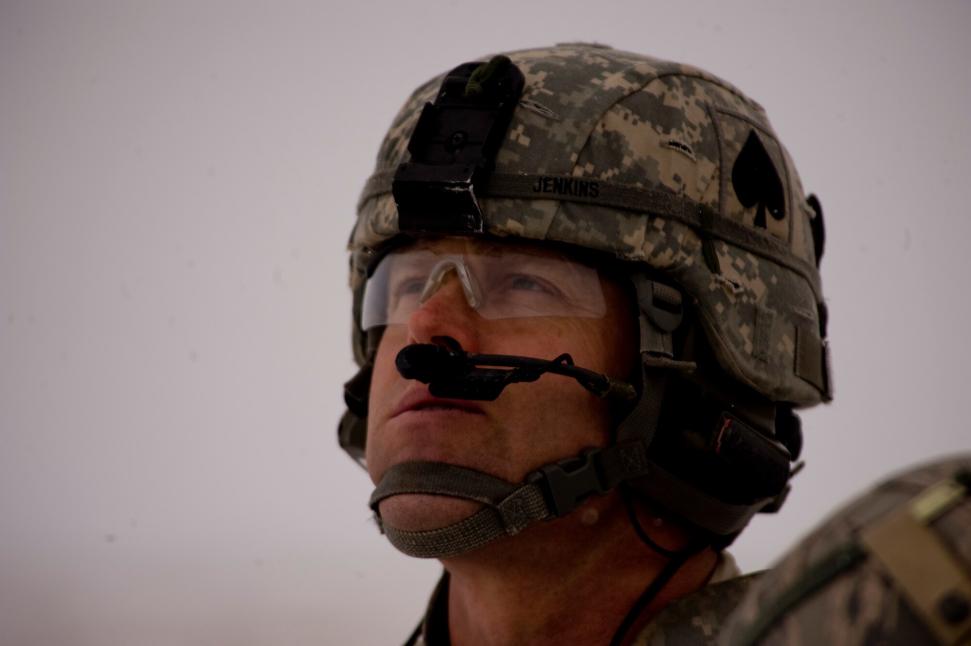 Colonel Sean Jenkins, 4th Brigade, 101st Airborne Division Commander observes as a C-17 Globemaster III air delivers bundles of fuel to Forward Operating Base Waza K'wah in the Paktika province of Afghanistan. The fuel was part of an air delivery to help sustain members of Task Force Currahee, 4th Brigade, 101st Airborne Division, whose only means of re-supply is through air delivery. (U.S. Air Force photo by Master Sgt. Adrian Cadiz)
