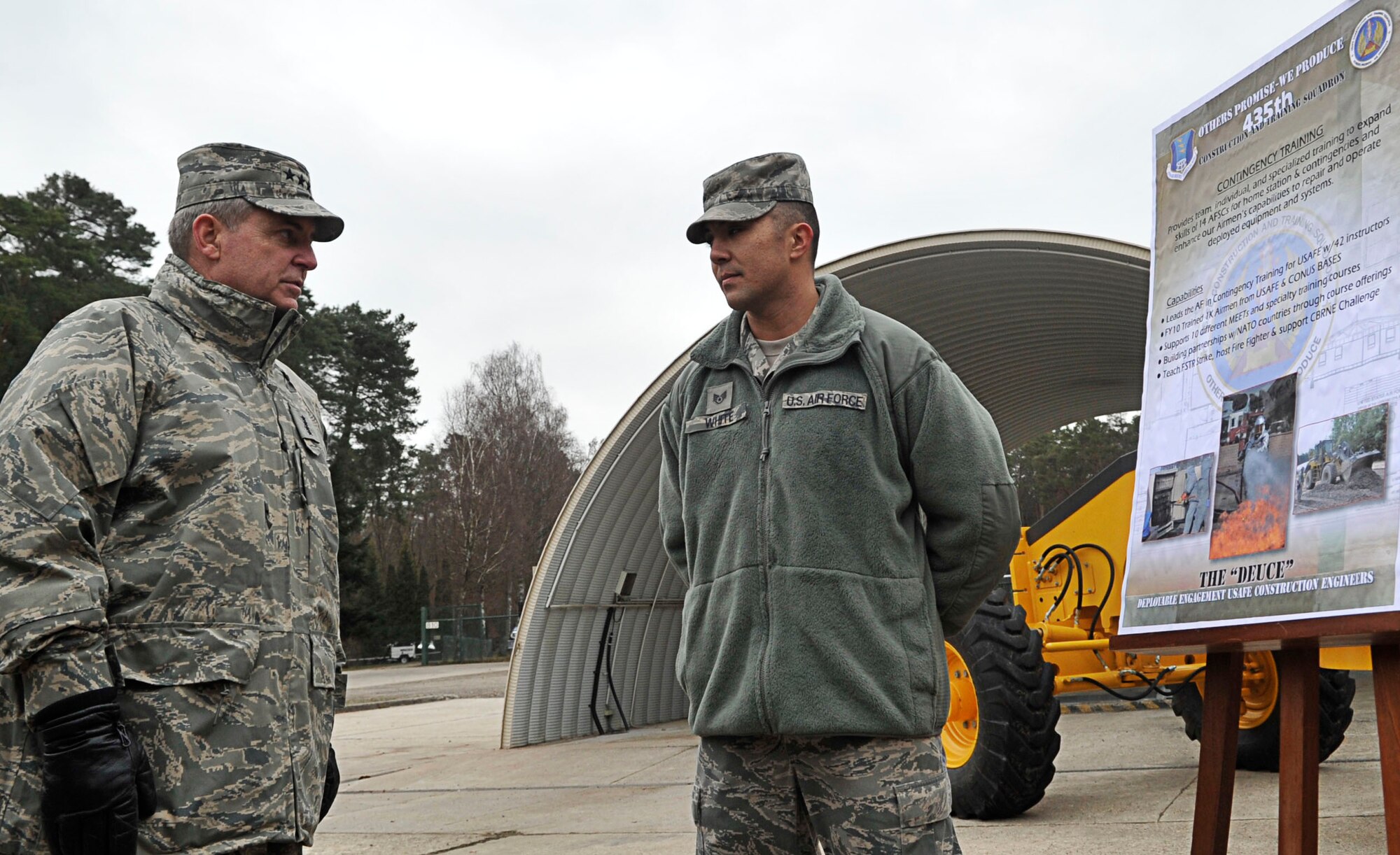 RAMSTEIN AIR BASE, Germany - Gen. Mark A. Welsh III, U.S. Air Forces in Europe commander, receives a brief on contingency training from Staff Sgt. Matthew White, 435th Construction and Training Squadron engineer, Jan. 28, 2011. Gen. Welsh and Chief Master Sgt. David Williamson, USAFE command chief, spent the day visiting the facilities of the 435th Air Ground Operations Wing. (U.S. Air Force photo by Airman 1st Class Desiree Esposito)