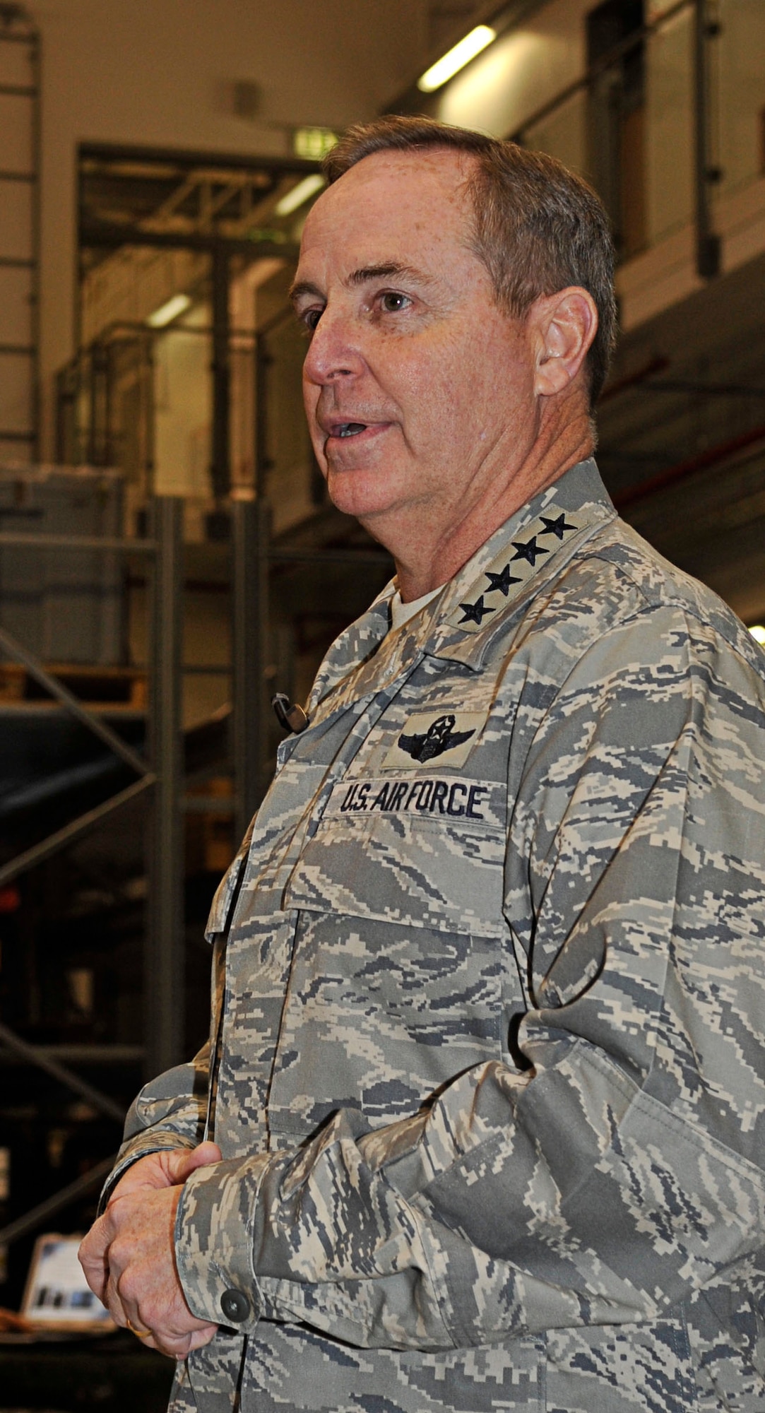 RAMSTEIN AIR BASE, Germany - Gen. Mark A. Welsh III, U.S. Air Forces in Europe commander, addresses members of the 435th Air Ground Operations Wing, Jan. 28, 2011. General Welsh and Chief Master Sgt. David Williamson, USAFE command chief, spent the day visiting the facilities of the 435th AGOW. (U.S. Air Force photo by Airman 1st Class Desiree Esposito)