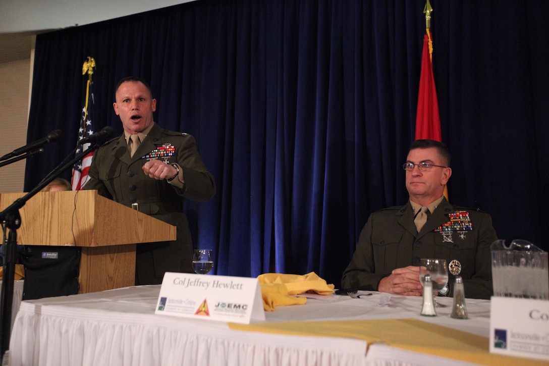 Col. Daniel J. Lecce (left), commanding officer of Marine Corps Base Camp Lejeune, and Col. Jeffrey Hewlett, commanding officer of Marine Corps Air Station New River, share places at the head table during the 16th Annual State of the Community Breakfast at the Officers’ Club aboard MCAS New River, Jan 3. Every year, leaders from the local military and other prominent organizations in Onslow County gather to enlighten the community of their statuses, as well as give a laundry list of the areas of success and improvement the can expect throughout the coming months.