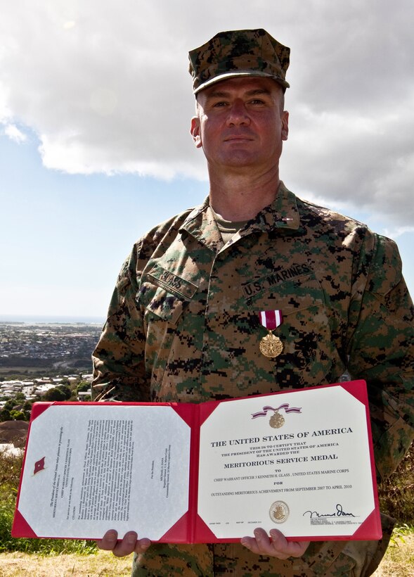 Chief Warrant Officer 3 Kenneth H. Glass received a Meritorious Service Medal Feb. 1 at Camp H.M. Smith, Hawaii, for his contributions as the fiscal officer for 2nd Supply Battalion, 2nd Marine Logistics Group, II Marine Expeditionary Force, from Sept. 2007 to April 2010. ::r::::n::Glass has deployed to Iraq three times in support of Operation Iraqi Freedom and once to Afghanistan in support of Operation Enduring Freedom. ::r::::n::Glass currently serves as U.S. Marine Corps Forces, Pacific’s financial management resource officer.