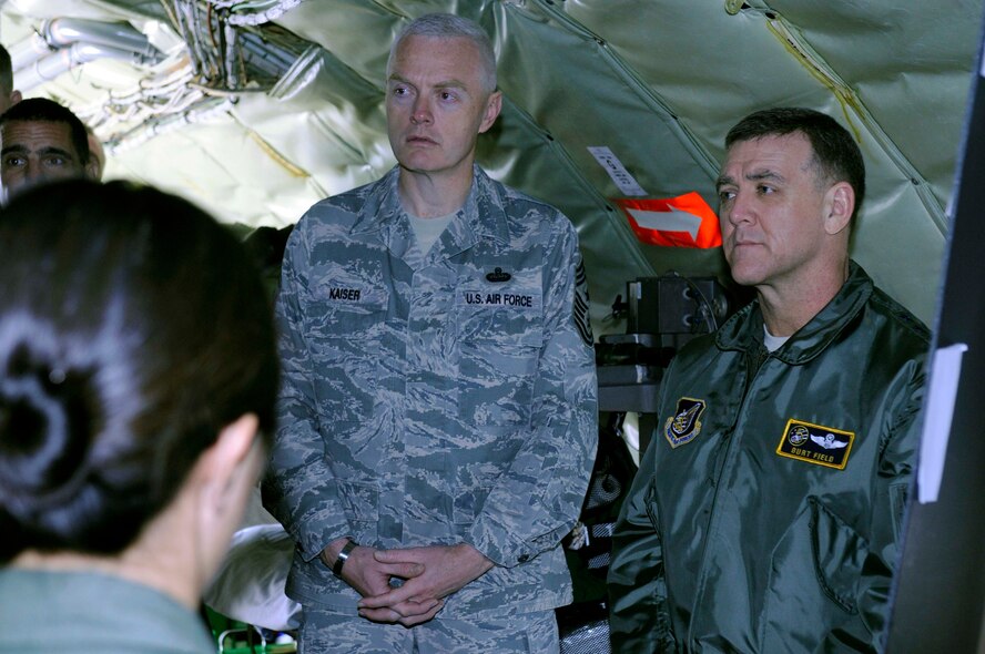 Lt. Gen. Burt Field and Chief Master Sgt. Andy Kaiser, U.S. Forces Japan and 5th Air Force commander and command chief master sergeant, listen to a briefing aboard a KC-135 Stratotanker on Kadena’s flight line, Feb. 1. The general and the chief attended briefings and took tours of Kadena’s 18th Medical Group, 33rd Rescue Squadron and housing areas during his stay on Okinawa. (U.S. Air Force photo/ Airman 1st Class Brooke P. Beers)