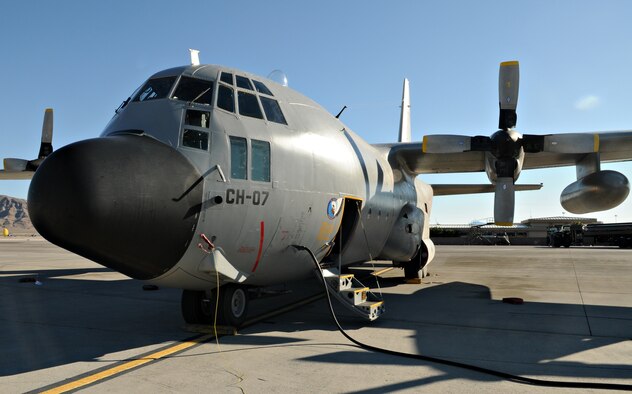 NELLIS AIR FORCE BASE, Nev. -- A C-130 Hercules from the Belgium air force's 20 Squadron rests on the flightline Feb. 2 after completing a mission in Red Flag 11-2. The C-130 is deployed from Melsbroek Air Base, Belgium, to participate in the combined exercise that provides a realistic combat training environment to the U.S. and its allies. (U.S. Air Force photo/Staff Sgt. Benjamin Wilson)
