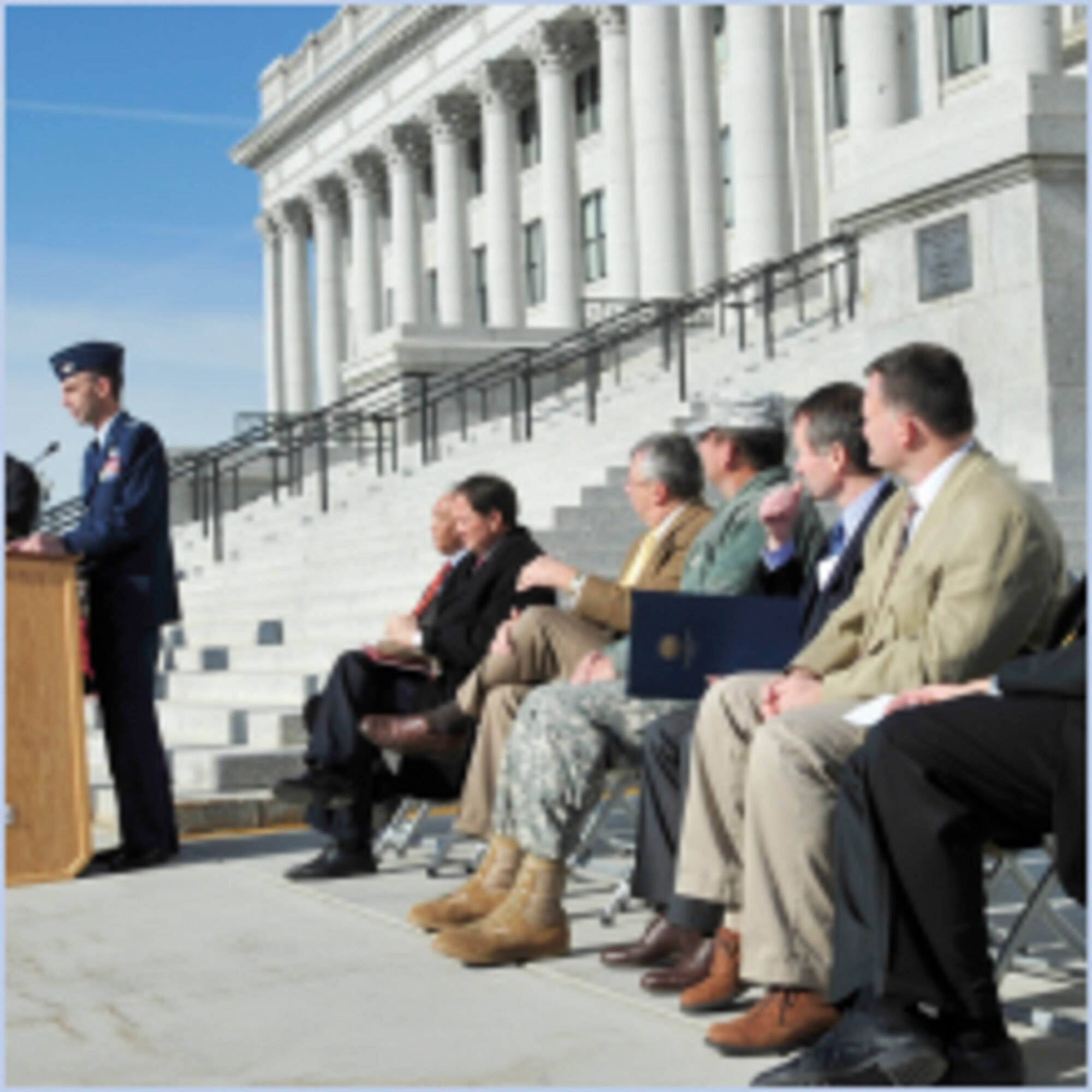 Col. Scott Zobrist, 388th Fighter Wing commander, speaks at an anniversary celebration in honor of the Browning Co. Jan. 24 at the Capitol in Salt Lake City. Also in attendance were Utah Gov. Gary Herbert and Maj. Gen. Brian Tarbet, Utah Army National Guard, who were among those seated to the right of the lectern. (U.S. Air Force photo by Kim Cook)