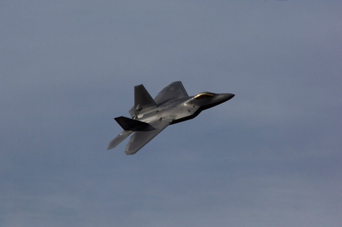 LANGLEY AIR FORCE BASE, Va. -- Maj. Henry Schantz, F-22 Demonstration Team pilot, executes exceptional aerial maneuvers during an annual demo team certification with the commander of the Air Combat Command Feb. 2. The F-22 Raptor is the world’s only operational fifth-generation fighter aircraft. (U.S. Air Force photo/ Airman 1st Class Camilla Elizeu) (Released)