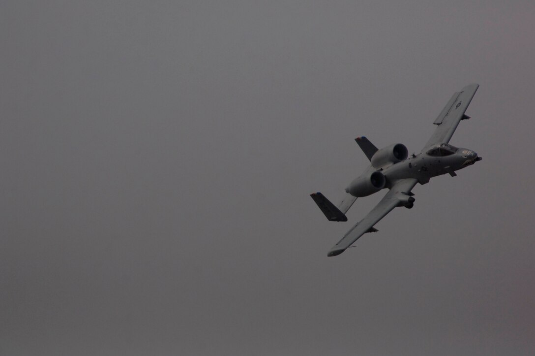 LANGLEY AIR FORCE BASE, Va. -- Maj. Dylan Thorpe, A-10 East Demonstration Team pilot from Moody Air Force Base, Ga., performs aerial tactic maneuvers during the demo team practice certification Feb. 1. The A-10 East, Viper West Coast, and F-22 demonstration teams met here for three days to receive annual certification from the commander of the Air Combat Command. (U.S. Air Force photo/Airman 1st Class Camilla Elizeu) (Released)