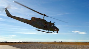 An UH-1N helicopter belonging to 37th Helicopter Squadron takes off from its base at F. E. Warren Air Force Base, Wyo. Jan. 27 in response to a call to the field in participation of a base-wide exercise simulating an attack in the field. (U.S. Air Force photo by R.J. Oriez)