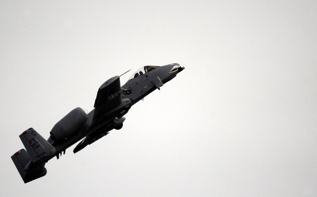 LANGLEY AIR FORCE BASE, Va. -- Maj. Dylan Thorpe, A-10 East Demonstration Team pilot from Moody Air Force Base, Ga., performs extreme aerial maneuvers during the demonstration team certification flight Feb. 2. The A-10, Viper West Coast and F-22 demonstration teams met for three days to receive annual certification from the commander of the Air Combat Command. (U.S. Air Force photo/Staff Sgt. Dana Hill) (RELEASED)