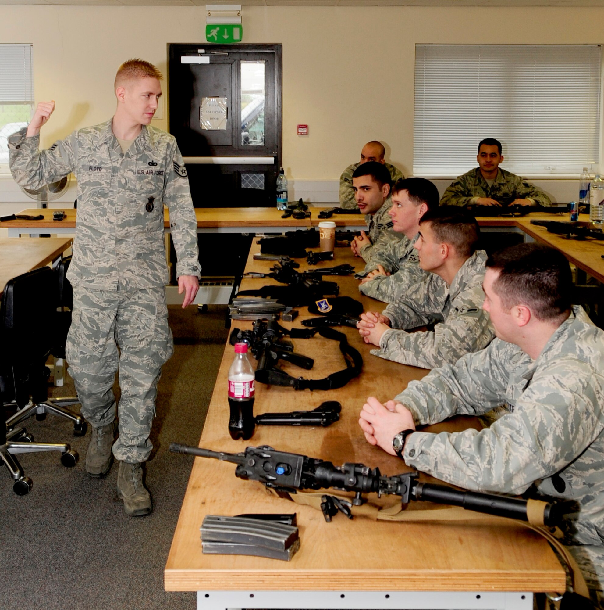 RAF FELTWELL, England -- Staff Sgt. Granville Floyd, 48th Security Forces Squadron combat arms instructor, instructs the classroom portion of a weapons qualification course for RAF  Mildenhall security forces members here Feb. 3, 2011. The classroom portion of the course covers basic weapons knowledge, nomenclature, characteristics, ammunition information, disassembly, inspections, reassembly, function checks, immediate action drills and fundamentals of firing. (U.S. Air Force photo/Senior Airman Ethan Morgan)