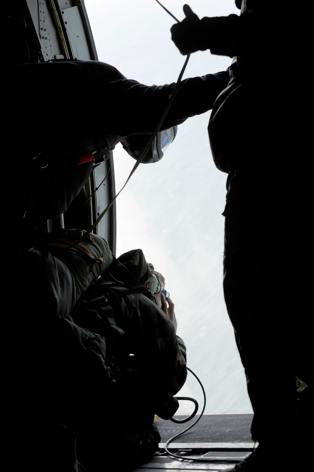 VANDENBERG AIR FORCE BASE, Calif. -- A pararescue instructor and trainee check for target visibility for a target during the rescue jump master course here Tuesday, Feb. 1, 2011.  The pararescuemen came to Vandenberg from bases all over the world for tactical jump training.  (U.S. Air Force photo/Senior Airman Andrew Satran) 

 
  