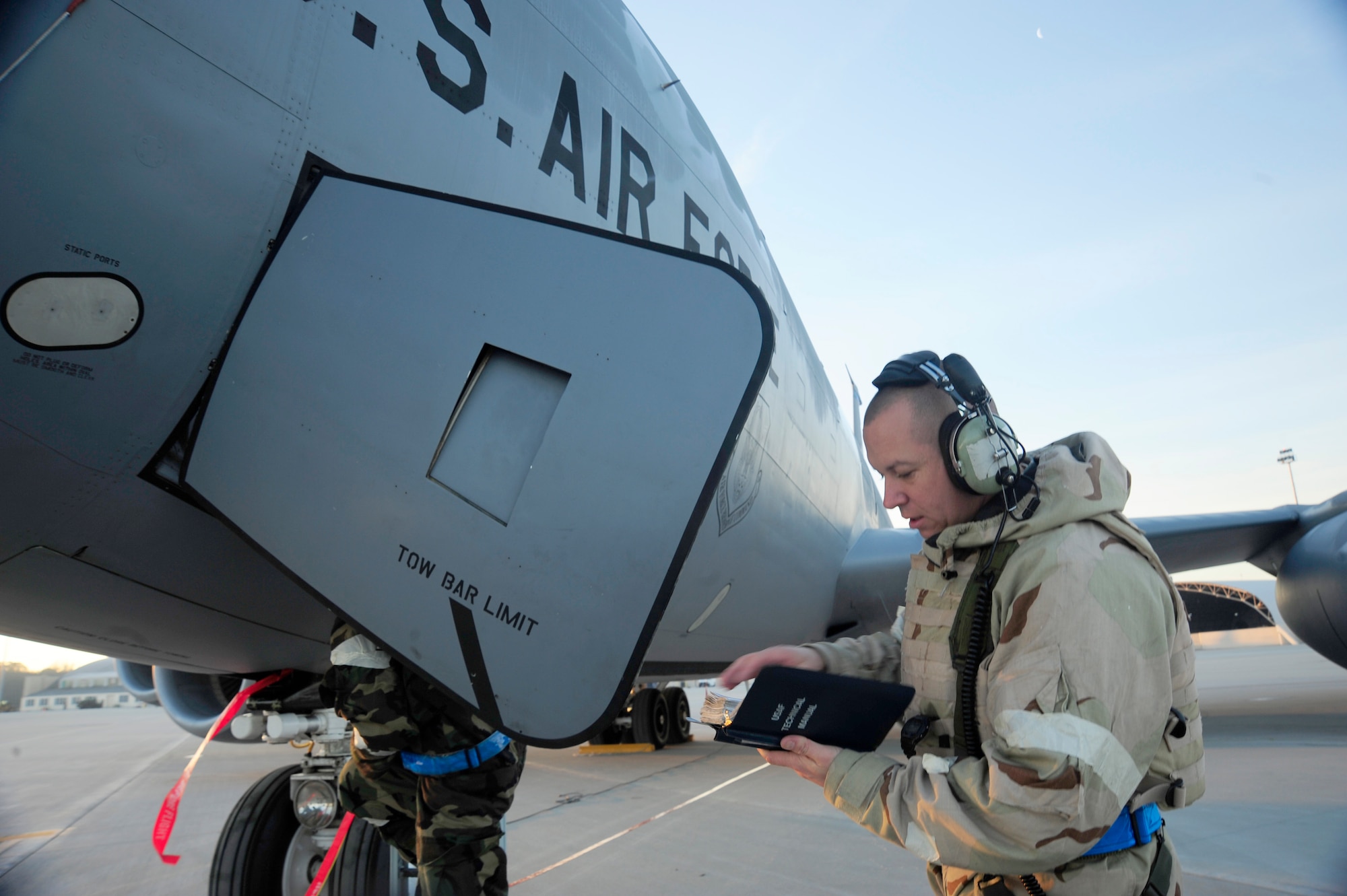 Staff Sgt. David Peralta reviews a technical order before conducting required maintenance on a KC-135 Stratotanker Jan 27, 2011, during an operational readiness inspection at the Savannah Combat Readiness Training Center in Savannah, Ga. Sergeant Peralta is assigned to the 112th Aircraft Maintenance Squadron. (U.S. Air Force photo/Staff Sgt. Angela Ruiz)
