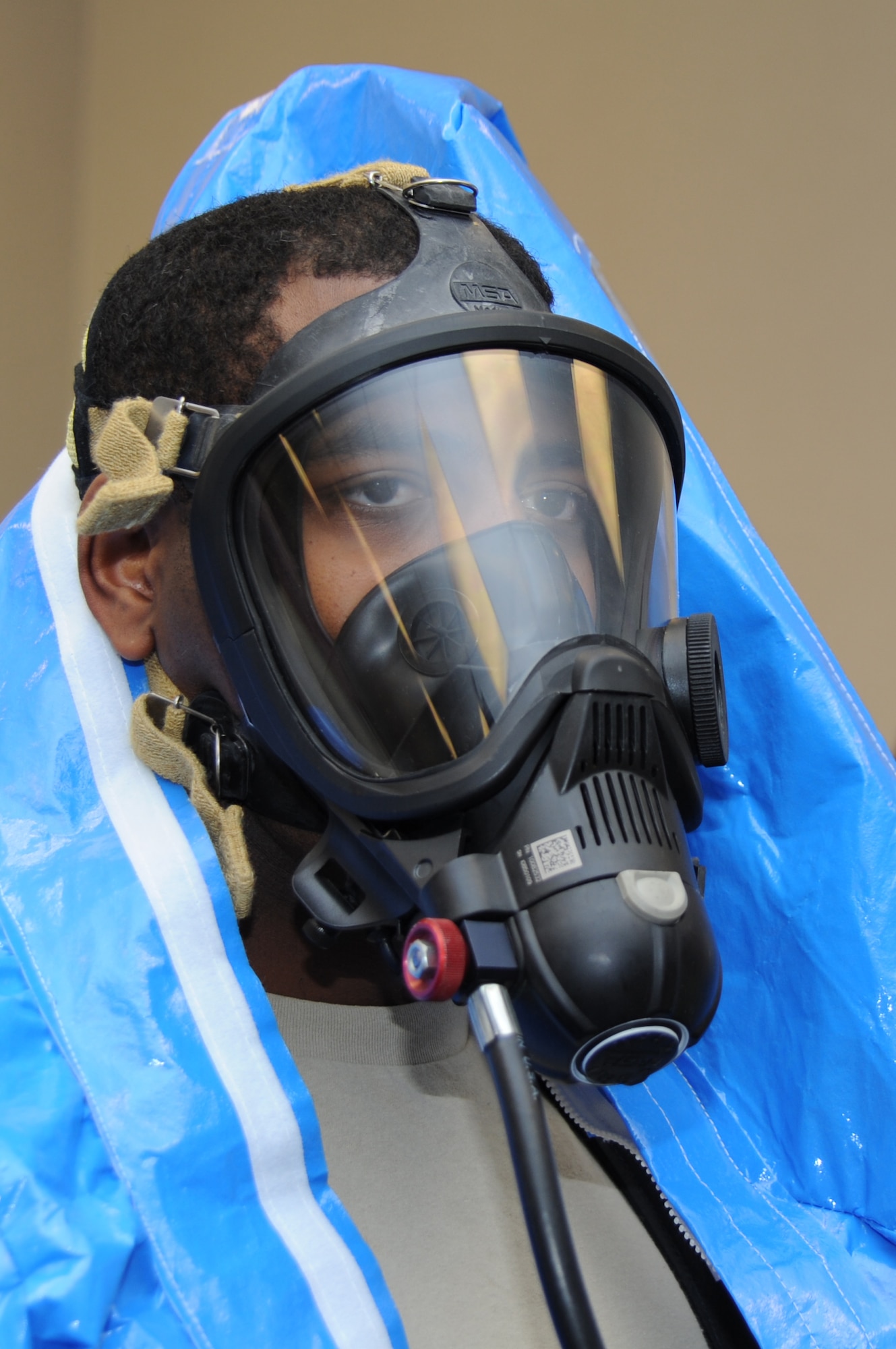 Staff Sgt. Omar Lewis, 118th AW Civil Engineering, tests his oxygen supply before entering as part of the second team Jan. 26.