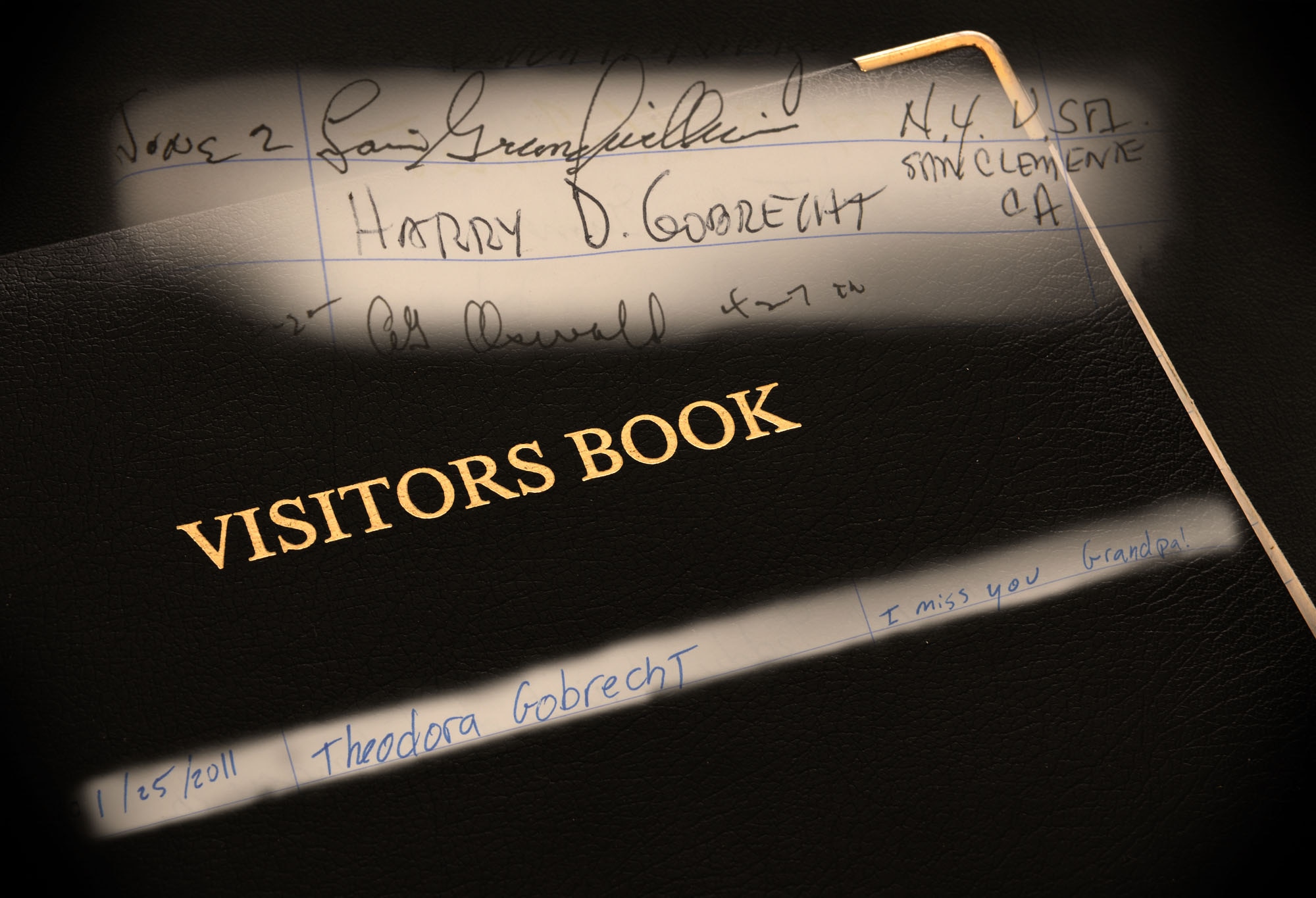 "I miss you grandpa!." Ms. Theodora “Teddi” Gobrecht signed the same visitor book at the 303rd Bomb Group (Heavy) Memorial at RAF Molesworth on January 25th 2011 that her grandfather Lt Col Harry D. Gobrecht (Ret) signed during the June 2, 2000 dedication of the memorial. )U.S. Air Force photo by Staff Sgt. Javier Cruz)