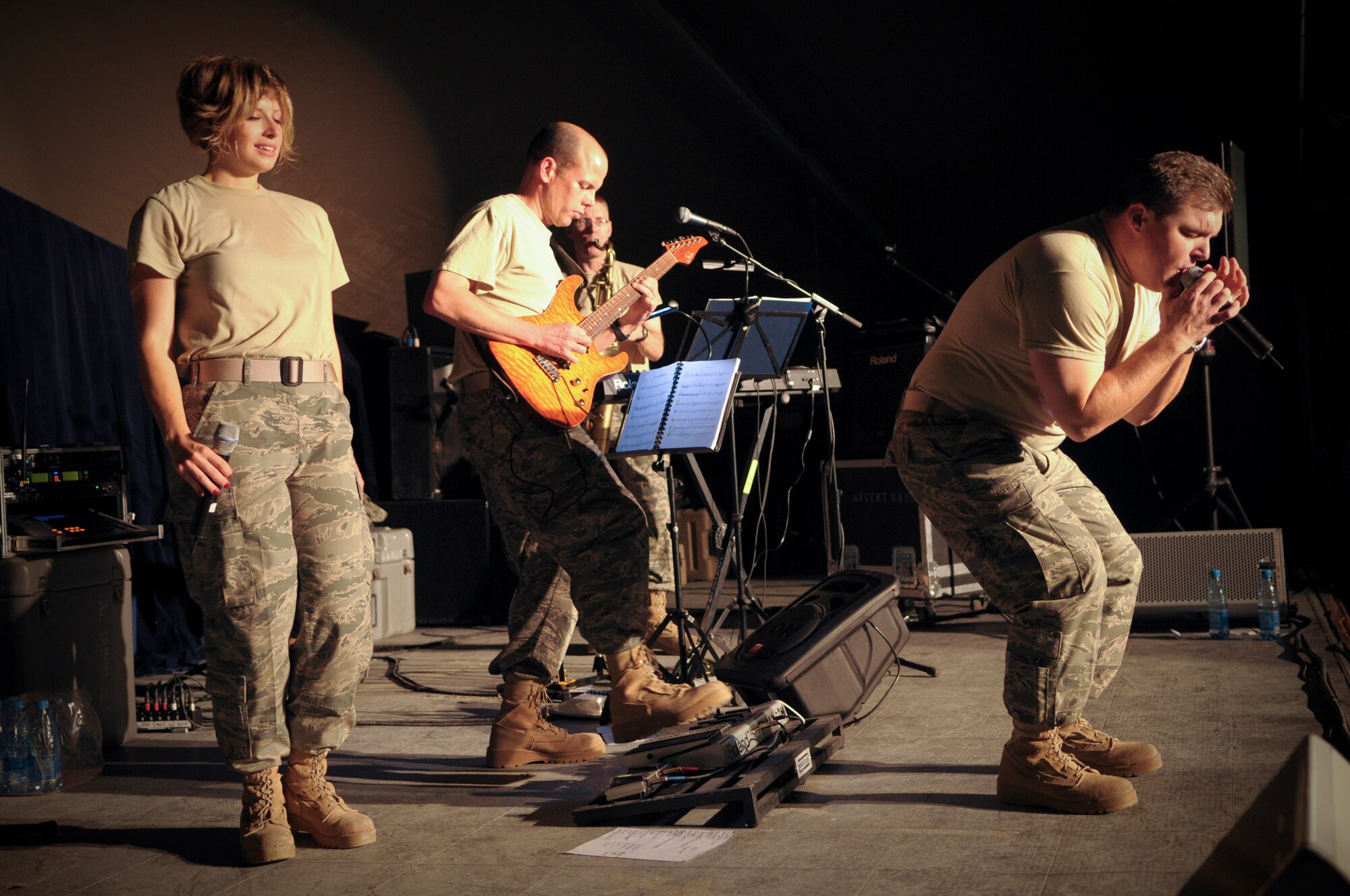 TRANSIT CENTER AT MANAS, Kyrgyzstan -U.S. Air Forces Central "Startlifter" band musicians show their skills during a performance at the transit center 29 Jan. The Starlifter band performed a wide variety of music for the for the military members to enjoy. (U.S. Air Force photo/Staff Sgt. Stacy Moless)