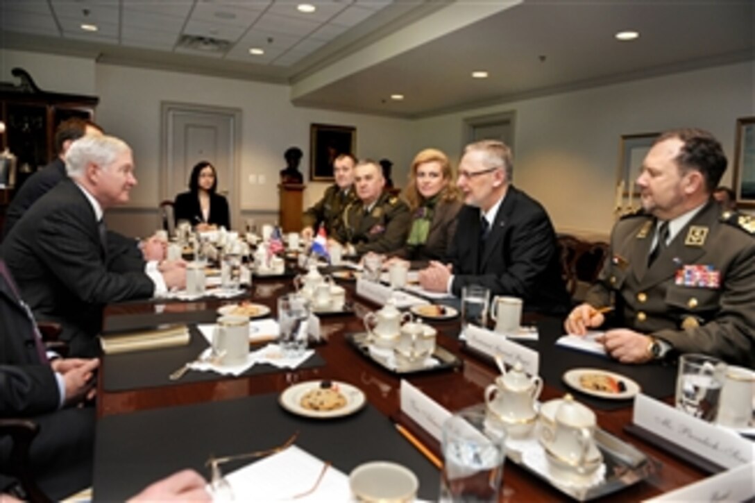 Secretary of Defense Robert M. Gates (left) hosts bilateral security talks in the Pentagon with Croatian Defense Minister Davor Bozinovic (2nd from right) on Feb. 2, 2011.  Joining Bozinovic in the meeting are Deputy Chief of Defense Lt. Gen. Slavko Baric (right), Ambassador to the U.S. Kolinda Grabar-Kitarovic, Defense Attach‚ Brig. Gen. Mate Paden and Military Advisor to the minister of Defense Col. Damir Terzic.  