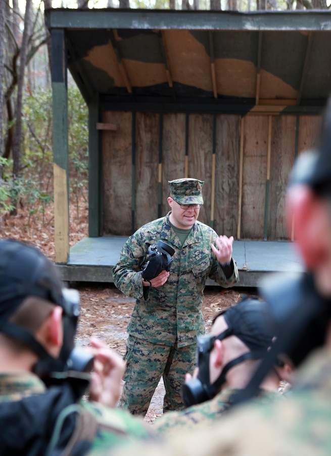 Gunnery Sgt. Clinton Schwarz, a chemical, biological, and radiological chief with the 24th Marine Expeditionary Unit, gives a brief about the M50 Joint Service General Purpose Gas Mask prior to a gas training exercise at the Marine Corps Base Gas Chamber on Camp Lejeune, N.C. Feb. 3. Marines with the 24th MEU trained on the new M50 JSGPM, M50 Joint Service General Purpose Gas Masks, which has been phasing out the 1980s-era M40 Field Protective Mask across the Marine Corps since September 2009.