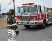 916th Air Refueling Wing fire fighters were busy putting out simulated fires in buildings and on aircraft during the wing's operational readiness inspection this week. (USAF photo by TSgt. Scotty Sweatt, 916ARW/PA)