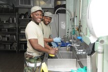 916th Force Support Squadron reservists worked hard to keep the wing fed during its operational readiness exercise. Salisbury steak and schnitzel were just two of the delightful meals they served a wing of more than 800 people. (USAF photo by TSgt. Scotty Sweatt, 916ARW/PA)