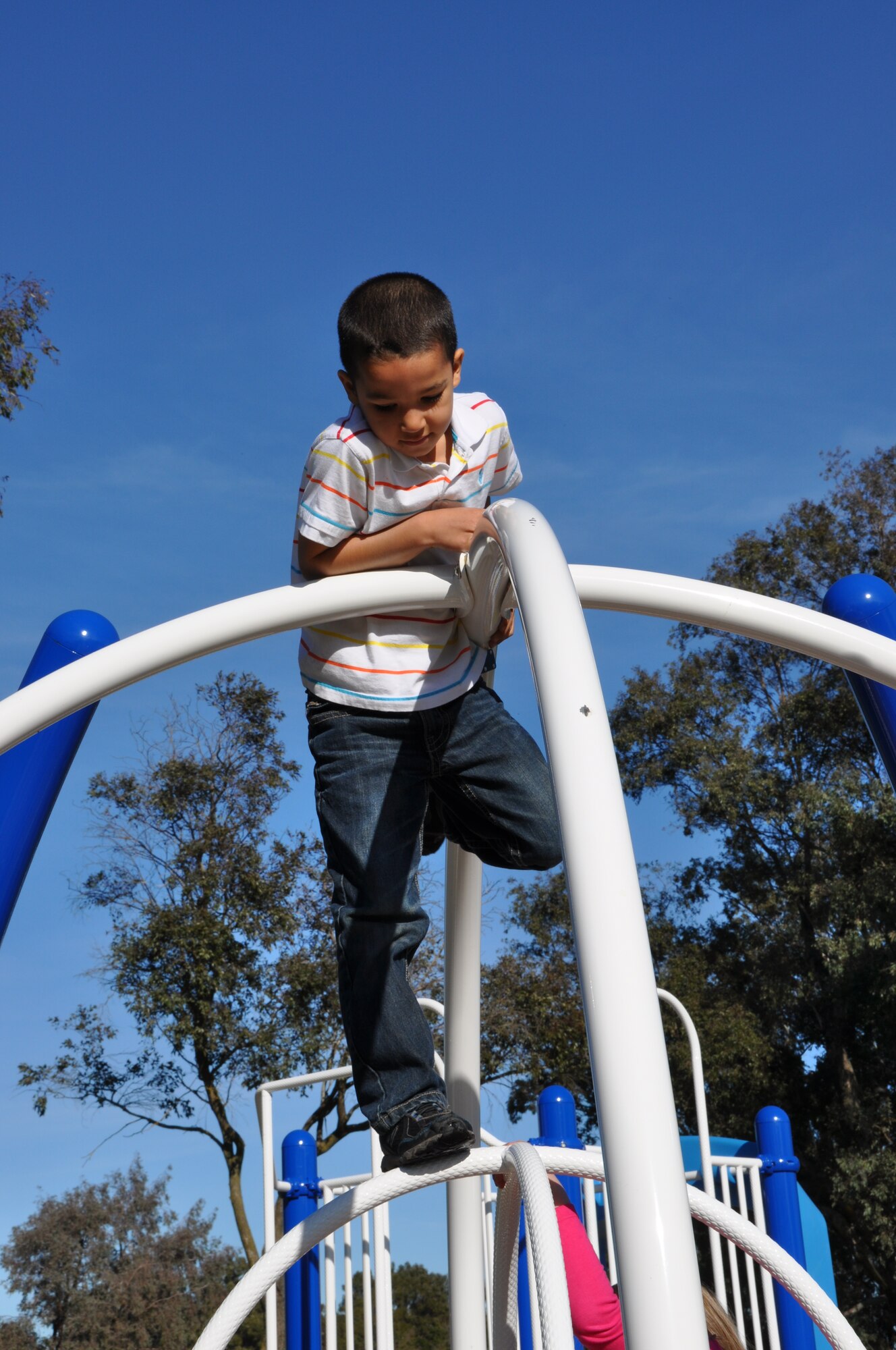 Maxwell Adamsplays on the center's playground equipment. The center is a reservation-driven place for Team Travis members to host events such as parties, baby showers, birthday parties and more,