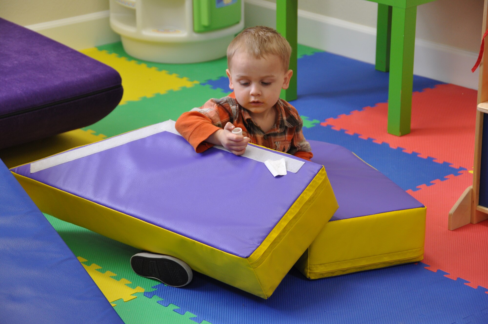 A child plays in the play room at the Balfour Beatty Community Center.