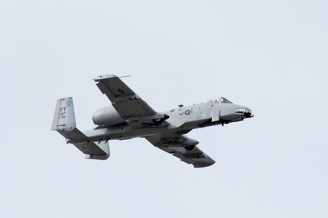 LANGLEY AIR FORCE BASE, Va. - Maj. Dylan Thorpe, A-10 East Demonstration Team pilot, shows off the capabilities of the A-10 aircraft during the demo certification here Feb. 2.  The A-10 East, Viper West Coast, and F-22 demonstration teams spent three days receiving their annual Air Combat Command certification.  (U.S. Air Force photo/Airman 1st Class Kayla Newman)(Released)

