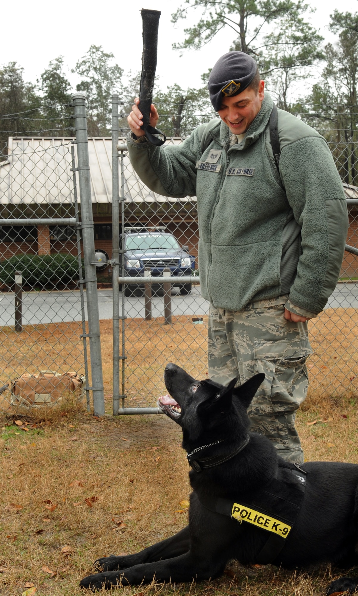 MOODY AIR FORCE BASE, Ga. -- Staff Sgt. Ryan Frederick, 23rd Security Forces Squadron military working dog handler, teases Ficko with a toy Feb. 4. Playing fetch helps keep the necessary bond between Sergeant Frederick and Ficko. (U.S. Air Force photo/Airman 1st Class Douglas Ellis)(RELEASED)
