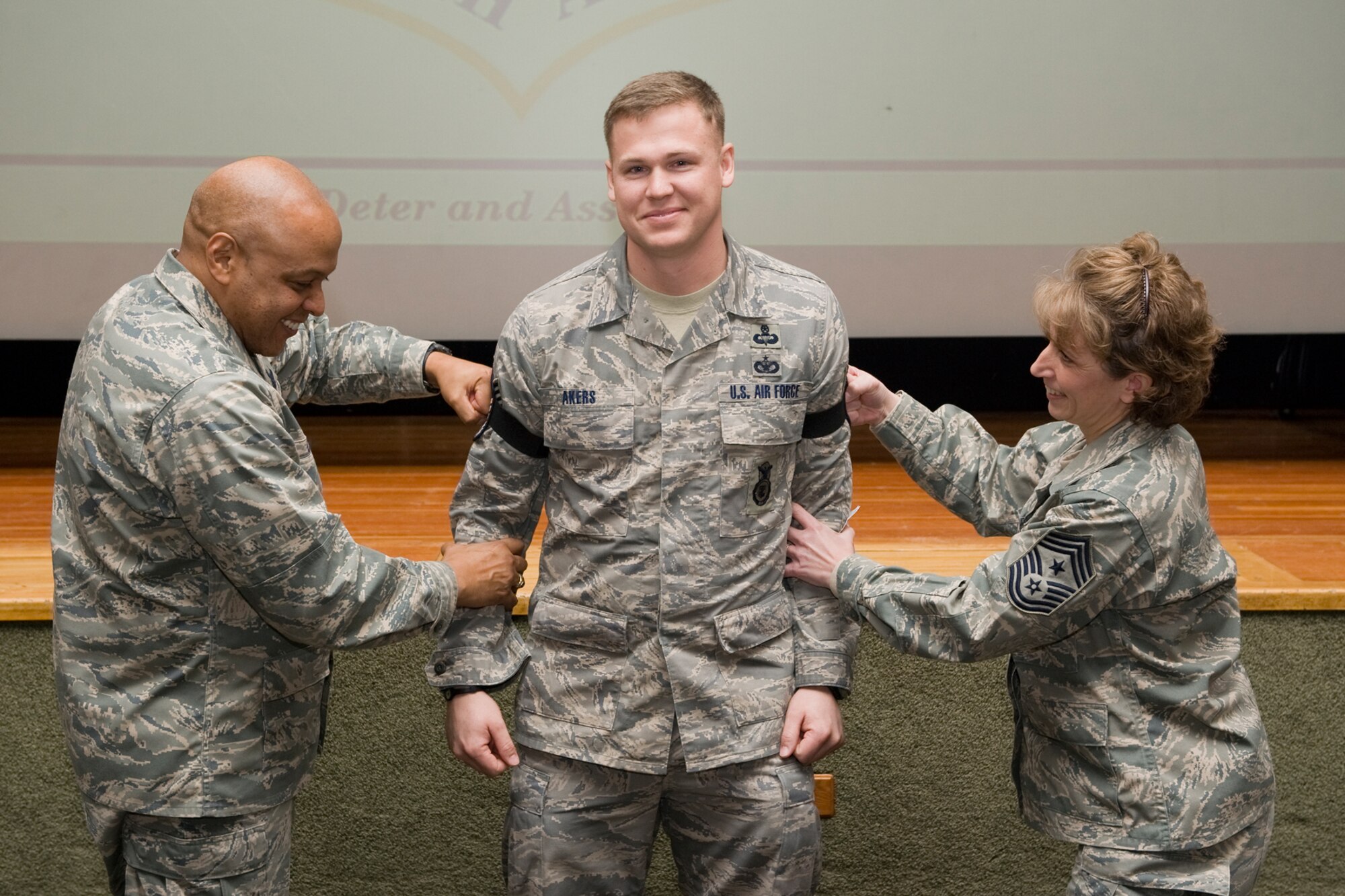 Now Master Sgt. Kevin Akers, the flight chief for the Tactical Response Force, was awarded his new stripes following the out brief for the Readiness Inspections Jan. 31 at the base auditorium.  His promotion was through the STEP program, and was awarded by Brig. Gen. (sel) Anthony Cotton, 341st Missile Wing commander, and Chief Master Sgt. Cari Kent, 341st MW command chief.  