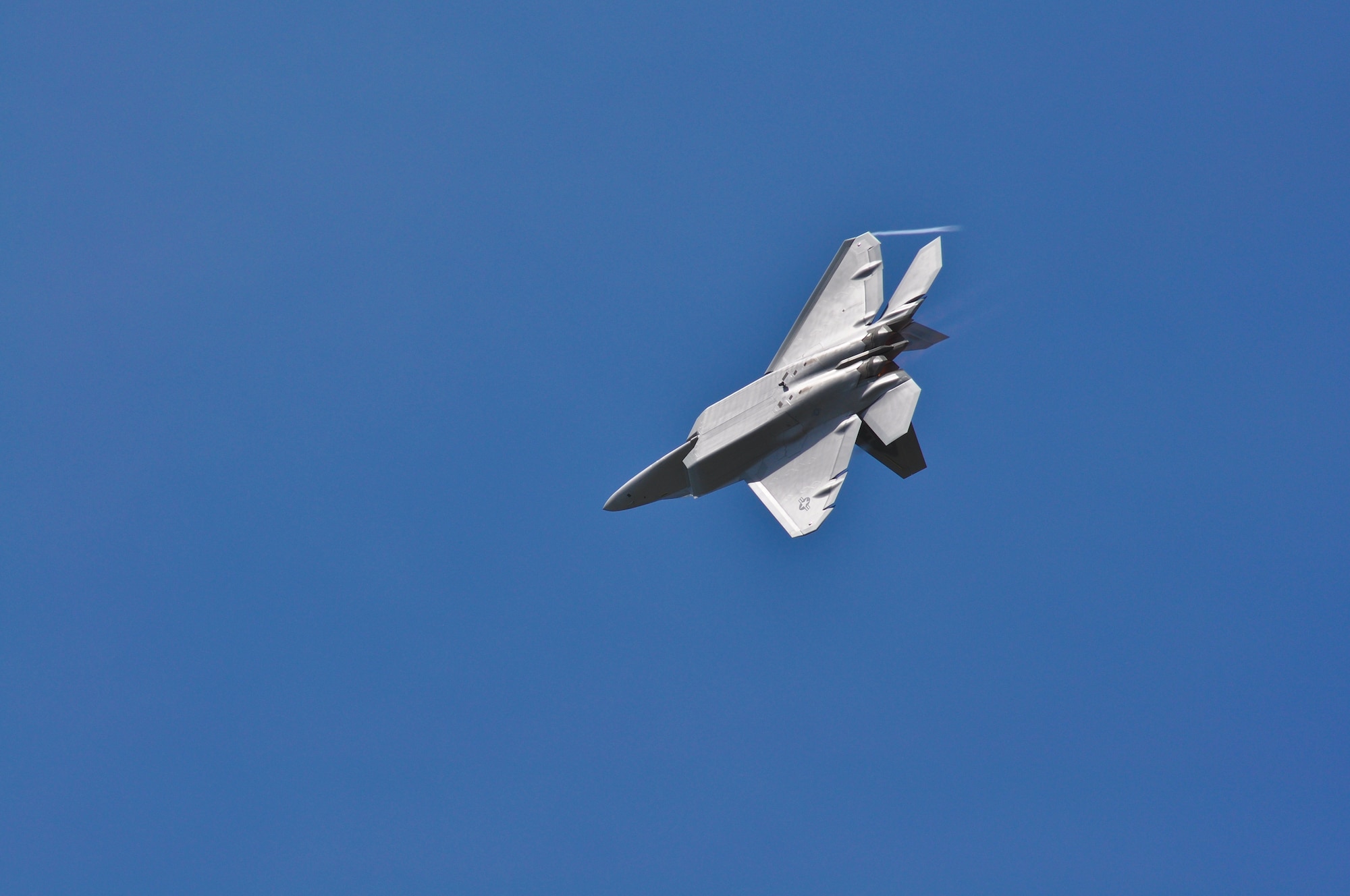 A pair of F-22 Raptors  practice refueling from a KC-135 Stratotanker on June 10, 2010. The F-22's were returning to Air Combat Command after participating in a joint training exercise with the 128th Air Refueling Wing.(US Air Force Photo by SSgt Jeremy Wilson / Released)