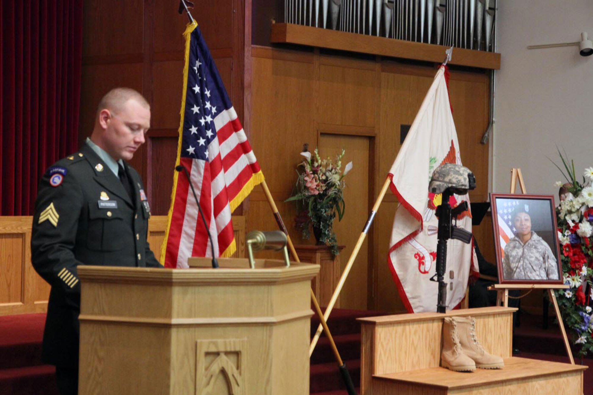 Army Sgt. James Patterson, 109th Transportation Company, 17th Combat Sustainment Support Battalion, 3rd Maneuver Enhancement Brigade, shares memories of Pfc. Amy Sinkler during a Jan. 28 memorial ceremony at the Joint Base Elmendorf-Richardson Soldiers’ Chapel. (U.S. Army photo/Staff Sgt. Jason Epperson)
