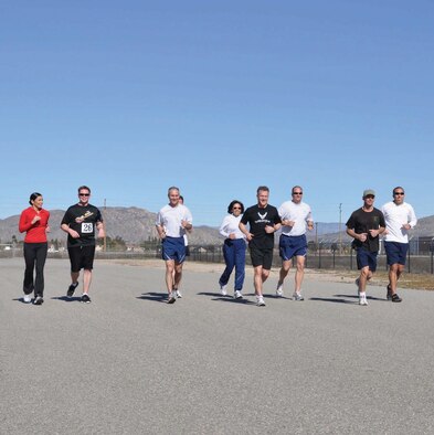 Runners cool down after the Happy New Year 5K race at March Air Reserve Base, Calif., January 5, 2011.  The base hopes to send 80 runners to the Air Force Marathon at Wright-Patterson Air Force Base in September.  (U.S. Air Force photo/ Megan Just)