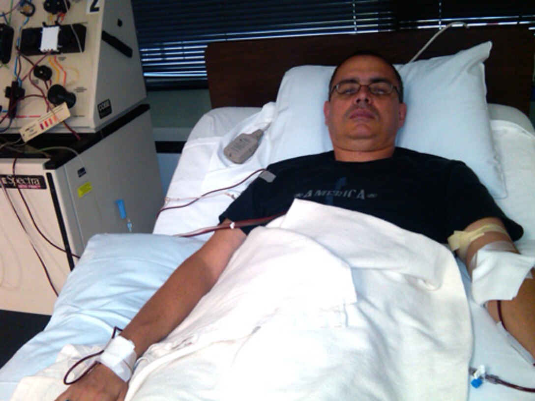 Master Sgt. Kevin Livingston, 512th Aircraft Maintenance Squadron Air Reserve Technician, donates stem cells through the process of apheresis at the Apheresis Associates of Northern Virginia, Annandale, Va. The Reserve maintainer participated in the C.W. Bill Young Department of Defense Marrow Donor Program last year and is encouraging his fellow Airmen to do the same. (U.S. Air Force photo)