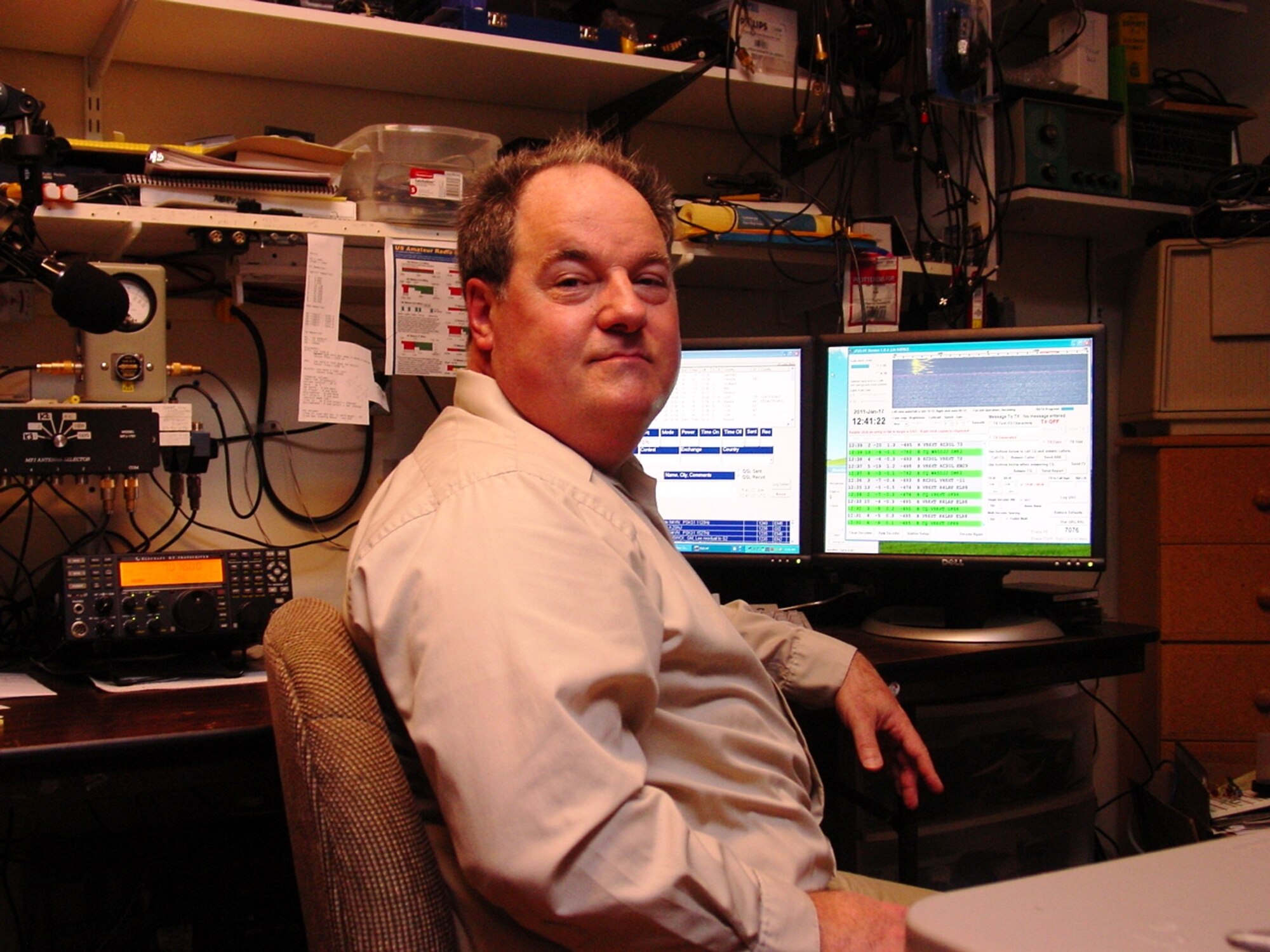 AEDC’s Bill Shappley, an electrical engineering lead with ATA’s control and data systems development branch, sits in his home-based “ham shack” while awaiting a reply after sending a message using Morse code over his computer-linked radio to another “ham” in Sweden. A fan of all things electronic, Shappley also enjoys building and operating radio-controlled model aircraft and building radio components. He works with both vintage radio systems and those with the most advanced technology. (Photo provided).