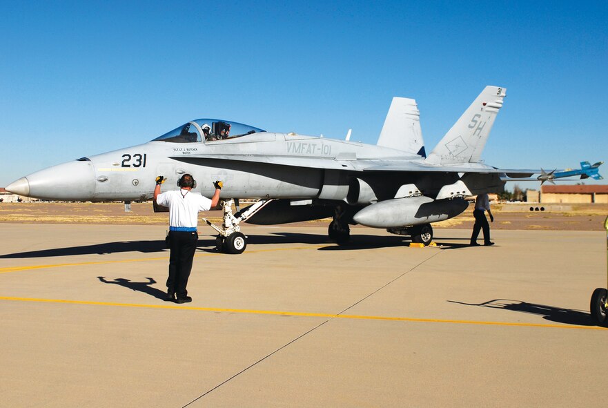 Mike Moore, 56th Equipment Maintenance Squadron transient alert, taxis in an F-18 Hornet from Marine Corps Air Station, Miramar, California, Jan. 28th during a fly-in.  (U.S. Air Force photo/Airman 1st Class Sandra Welch)