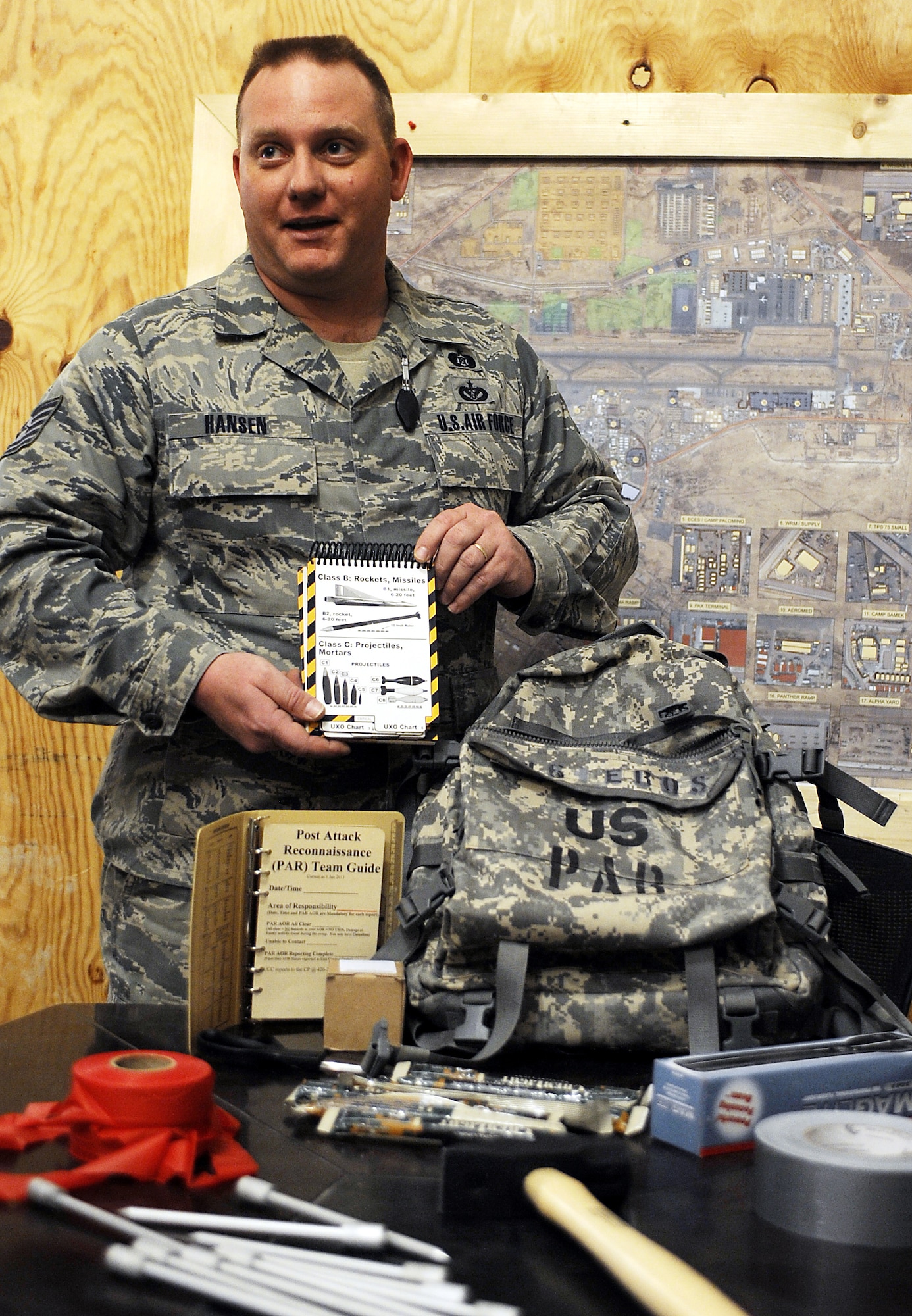 Tech. Sgt. Mark Hansen gives a briefing about post attack reconnaissance kits Feb. 04, 2011, at Kandahar Airfield, Afghanistan. Sergeant Hansen develops emergency response plans and trains more than 200 Airmen to be representatives for the emergency operations centers, PAR teams, and to be emergency management representatives within their units. Sergeant Hansen is the emergency manager assigned to the 451st Expeditionary Civil Engineering Squadron. (U.S. Air Force photo/Senior Airman Willard E. Grande II/Released)