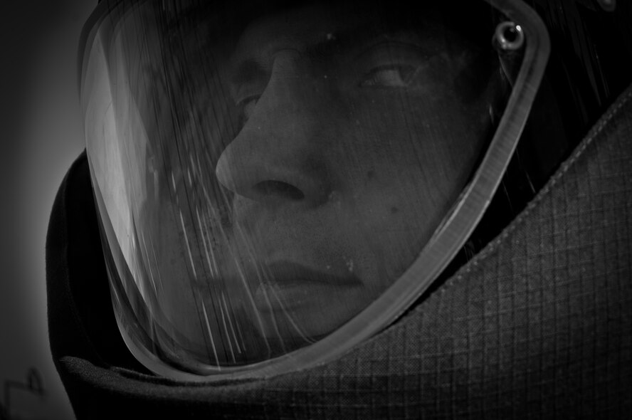 Senior Airman Nicholas Karpenko from the 39th Civil Engineer Squadron, Explosive Ordinance Disposal Flight, takes a moment from training for a photo Feb. 2, 2011 at Incirlik Air Base, Turkey.  Airman Karpenko was awarded the Air Force Combat Action Medal for taking action with insurgents during a six-month deployment to Afghanistan. The AFCAM may be awarded to Airmen who have been involved in direct fighting situations where they risked their lives in an enemy engagement. The medal was created to recognize Air Force members who were engaged in air or ground combat off base in a combat zone.  (U.S. Air Force photo by Staff Sgt. Alex Montes/RELEASED)