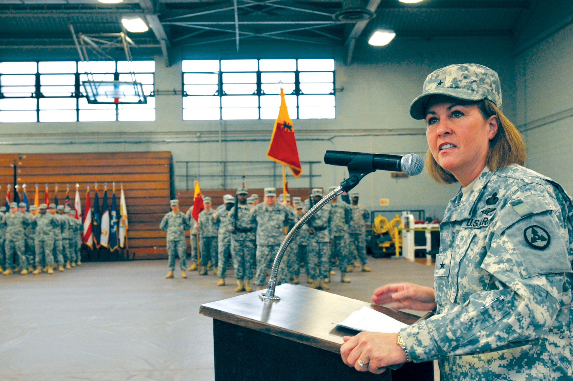 Brig. Gen. Robin Akin, commander, 3rd Sustainment Command (Expeditionary), addresses the crowd at Anderson Field House during the 7th Sustainment Brigade casing ceremony. Akin talked about Soldier expectations while on deployment saying, “These Soldiers are going to do great things, they are going to do to the right thing and I guarantee they will do it well. This organization is ready."

