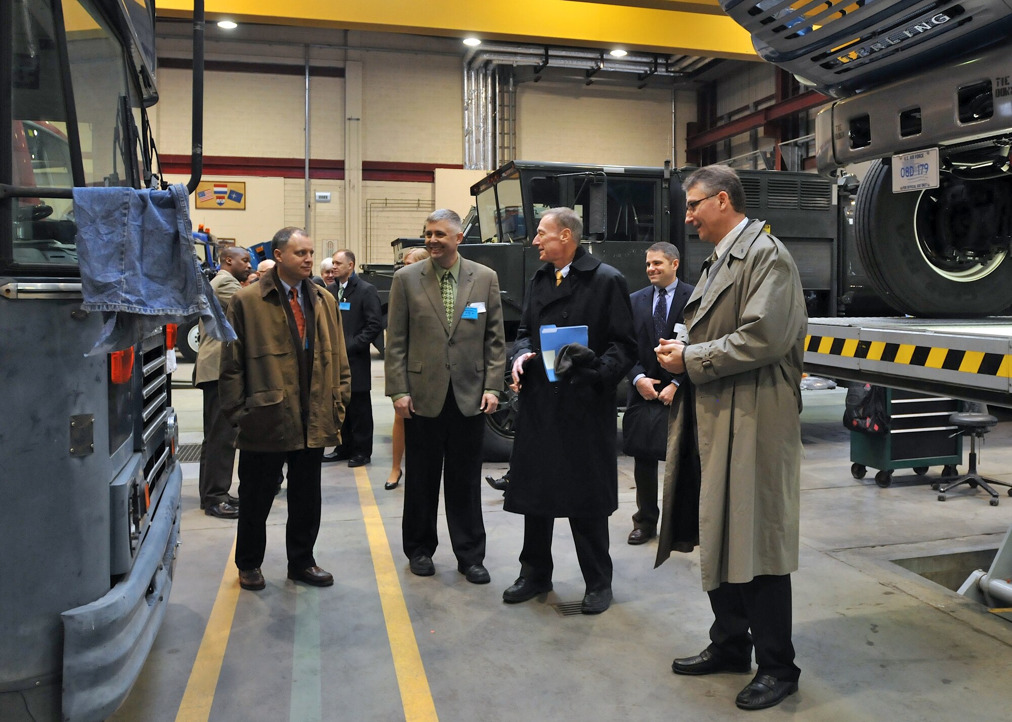 (From left to right) Col. Stephen Lambert, 86th Airlift Wing vice commander; Col. David Haase, 86th Logistics Readiness Group commander; Mr. Arnold Campbell, U.S. Charge d'Affairs to Luxembourg; Maj. Ryan Coyne, 86th Materiel Maintenance Squadron commander; Mr. Andre Straus, Central Regional Storage Facility director, explore one of the warehouses at the CRSF Feb. 3 as part of an orientation tour for the Charge d'Affairs, who recently assumed his post as top U.S. diplomat in Luxembourg. (U.S. Air Force photo by Tech. Sgt. Markus M. Maier)